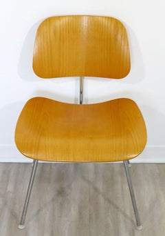 Ensemble moderniste de 4 chaises Eames pour Herman Miller DCW en bois chromé des années 2000