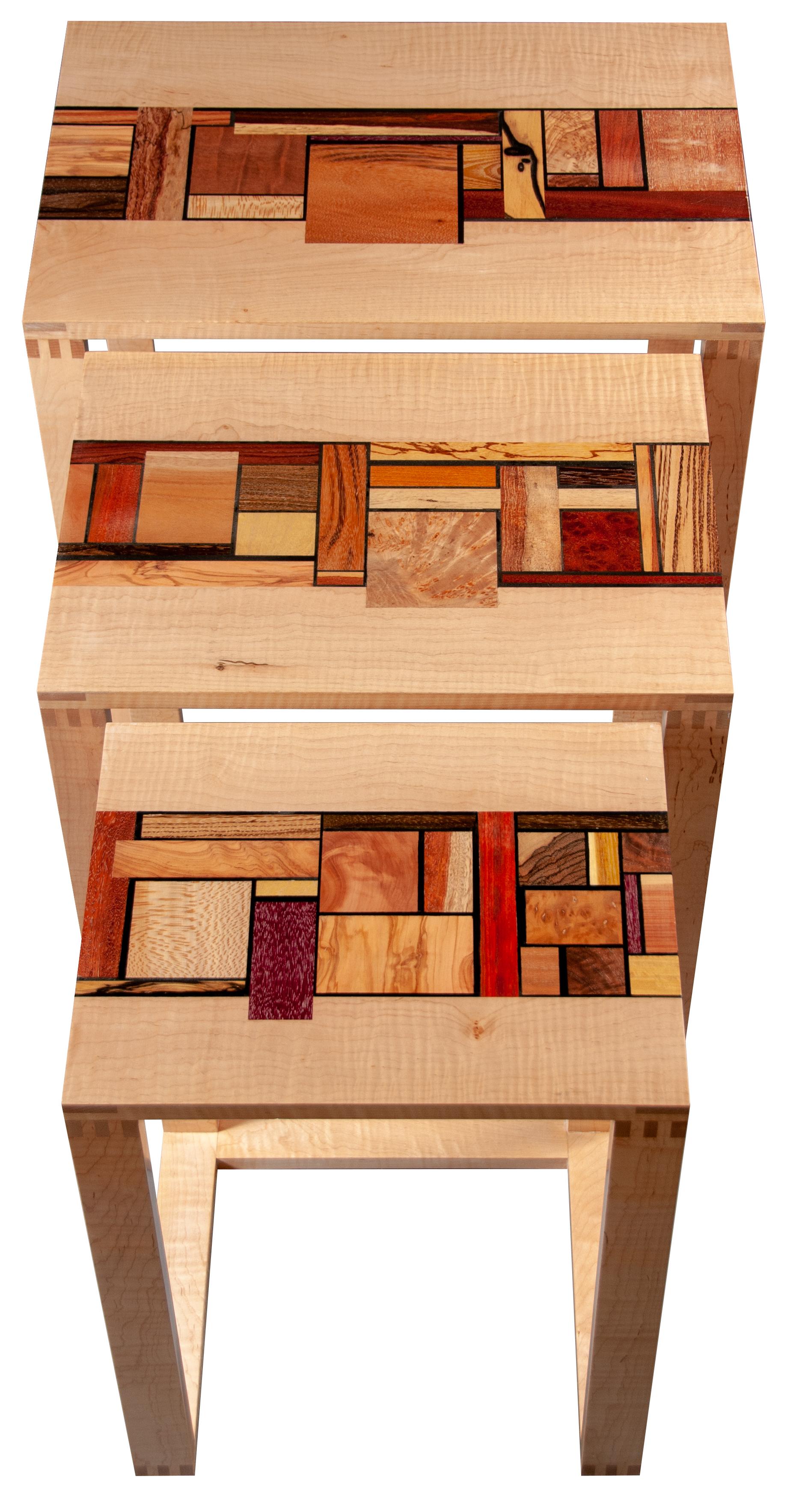 Title: “De Stijl Mondrian’s Work” 

Year work was completed: 2016

Form: Nested tables

Materials: Table frame, Tiger Maple; Mosaic pieces 50 different species and figures of wood from over 18 countries: American Black Walnut plain, mottled,