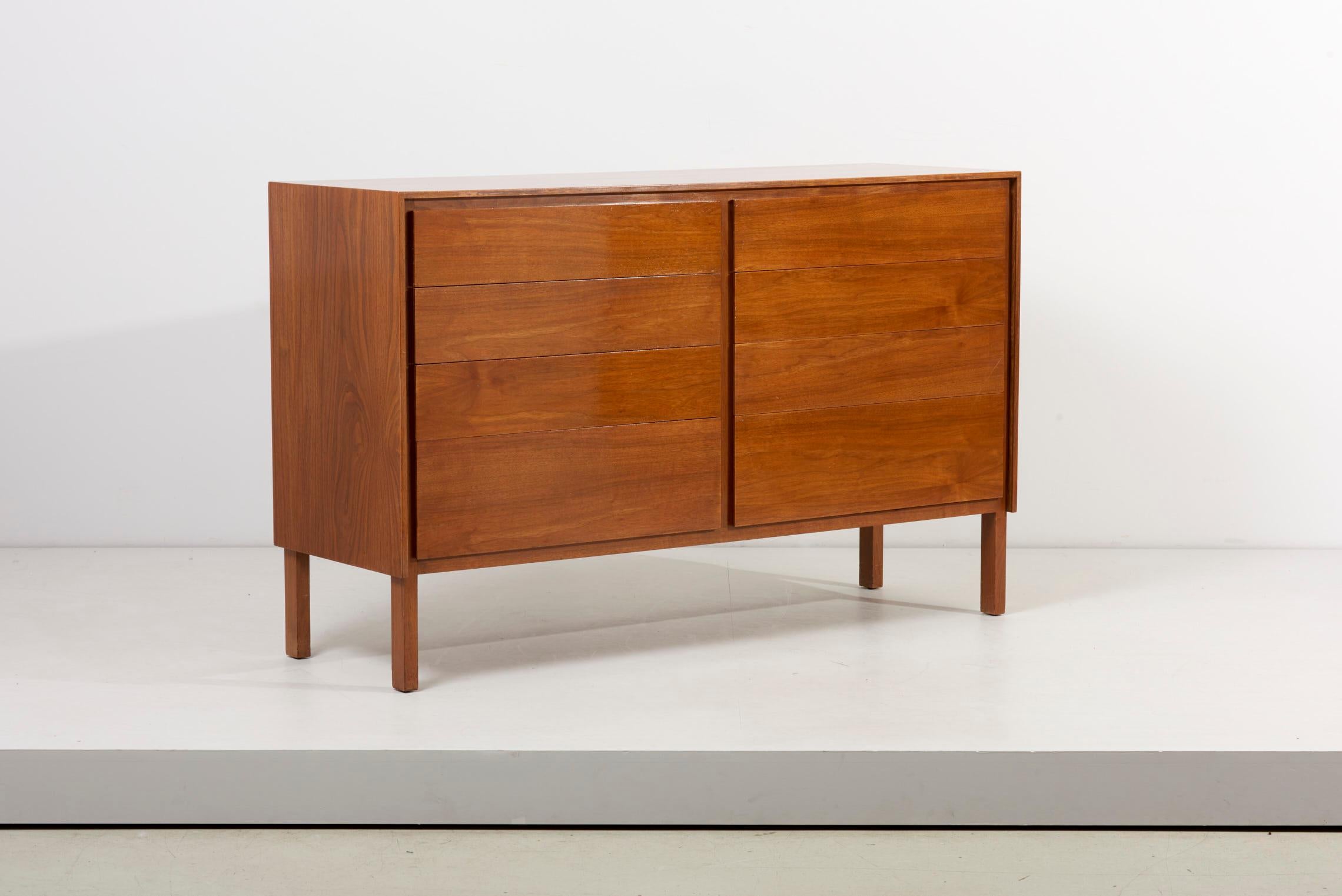A very modern non handle sideboard in Walnut by Allan Gould, USA 1960s 
The drawers can be opened with a little gap on the sides of the drawers.
All opens very smooth and easy going.