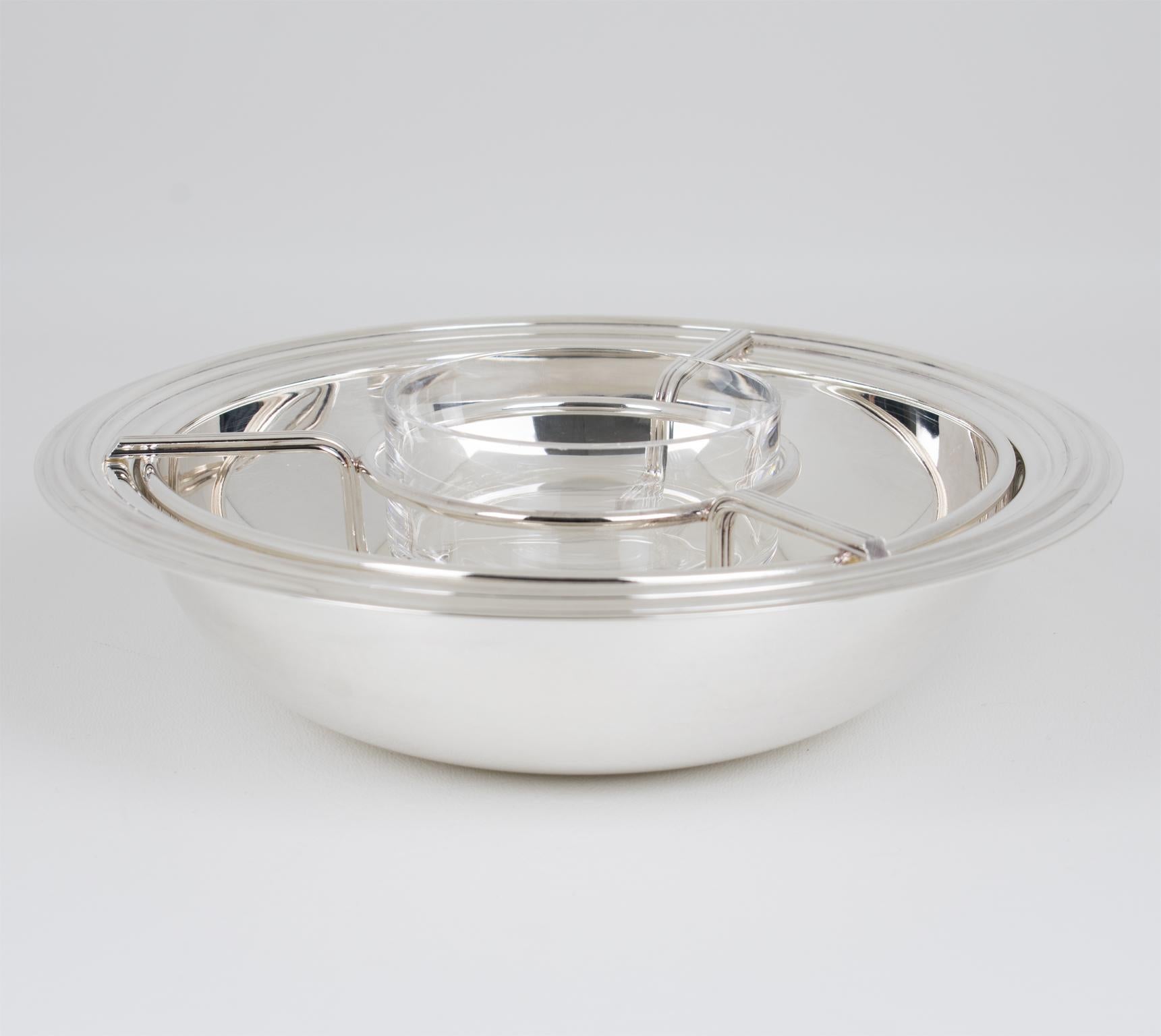 Maestri Argentiera, Italy designed this modernist silver plate and crystal caviar serving bowl, dish, or chiller, circa 1970. The sophisticated design boasts a streamlined geometric shape, featuring a rounded silver-plated metal ice container with a