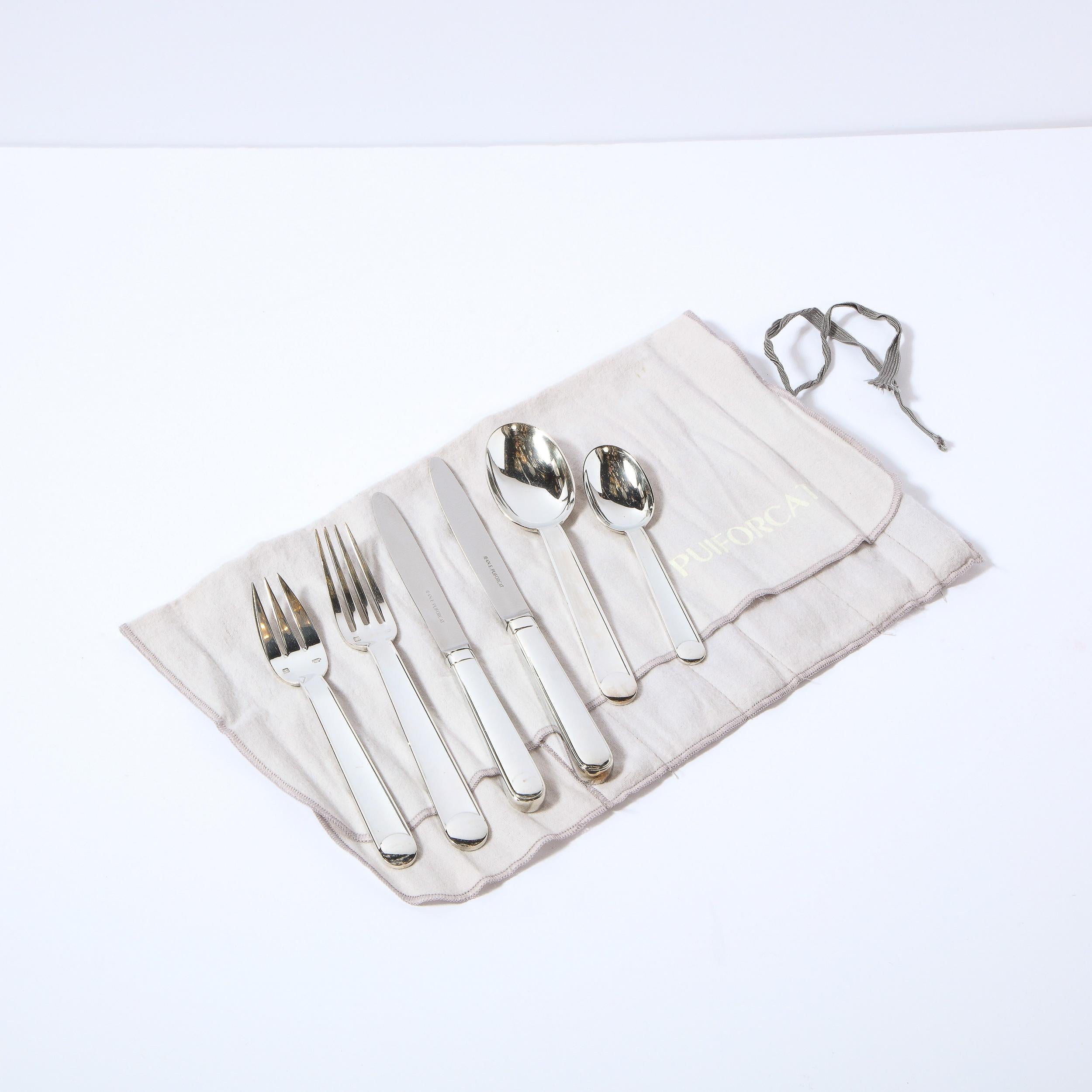 Designed in 1934 by Jean Puirocat for the Ocean liner Normandie that brought passengers from New York to Le Havre, this elegant flatware graced the dinner table for its first-class passengers. The set has been celebrated since its inception for its