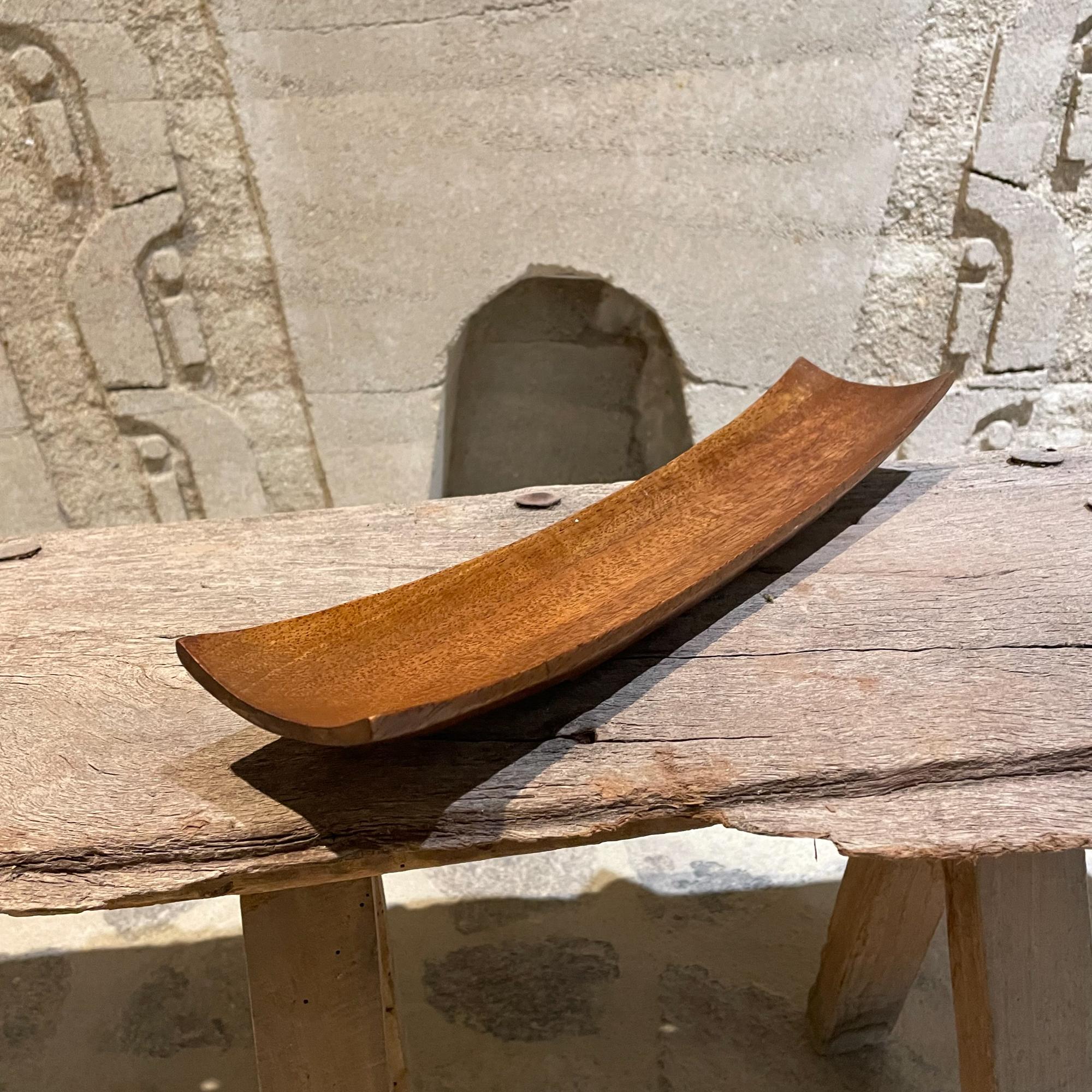 Modernist slim sculptural canoe bowl tray- catch it all designed in Koa Wood 1970s
Maker stamped unable to discern. Similar to Dansk designs and Jens Quistgaard.
Measures:4 H x 10 L 2 W
Original vintage condition preowned piece.
Refer to images