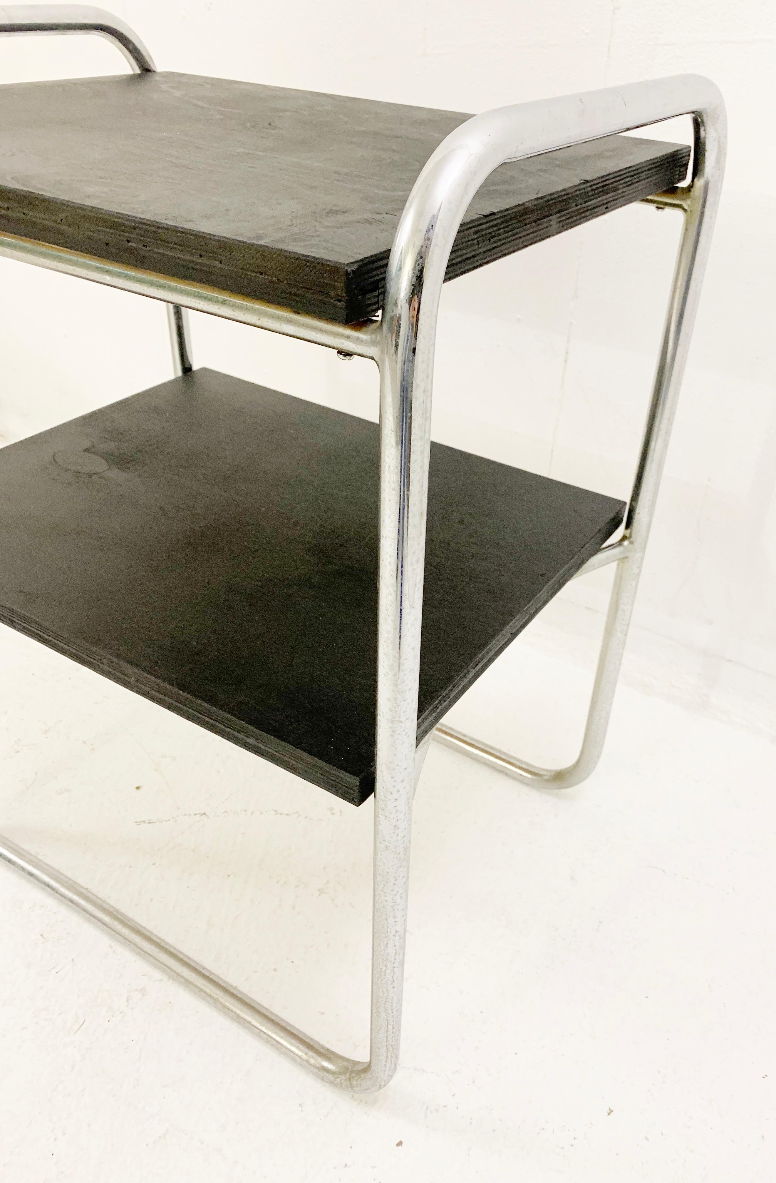 Modernist small wood and tubular steel side table - 1930s.