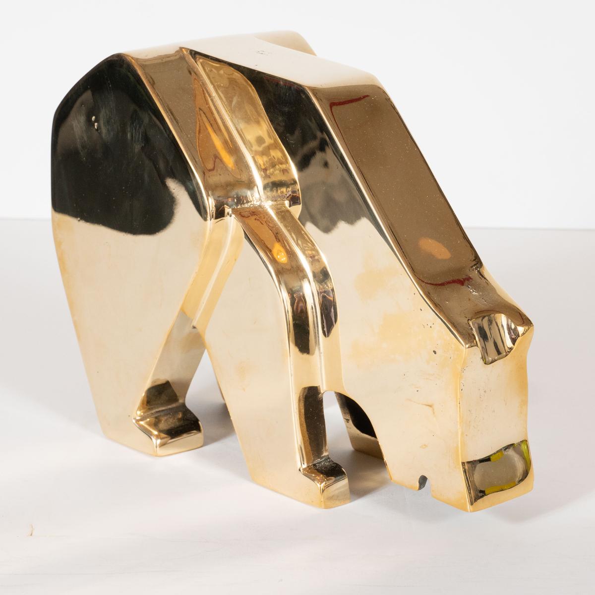 Modernist bear sculpture composed of solid, polished brass.