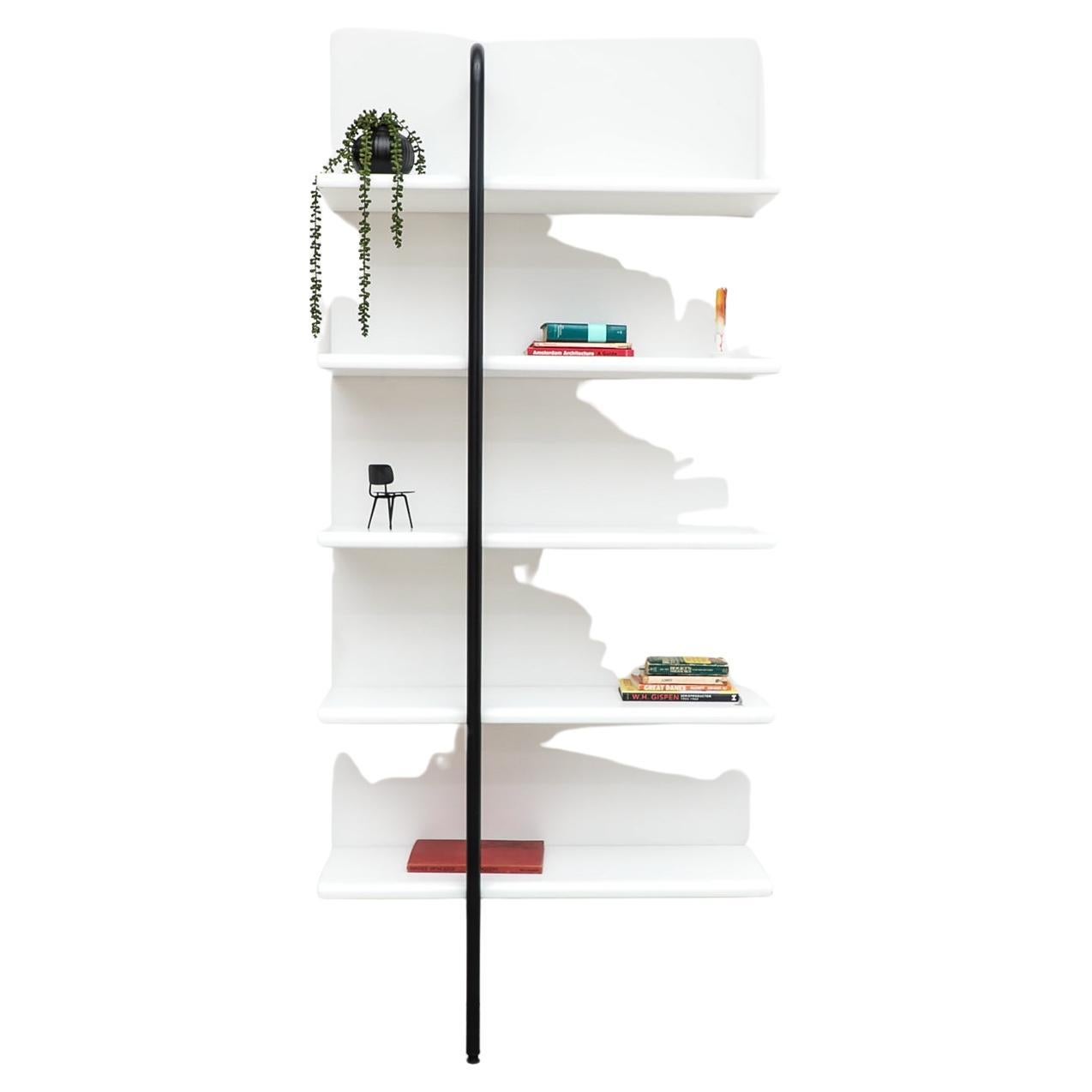 Modernist Sottsass style white shelving unit with adjustable black stability bar. In original condition with visible wear consistent with its age and use.