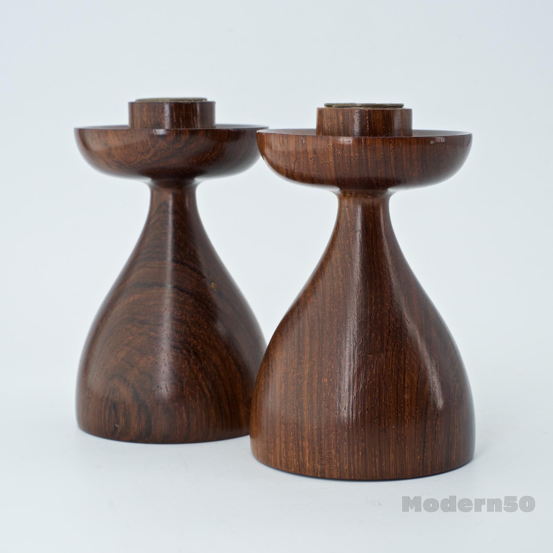 Wonderful South American turned wood candlestick holders.