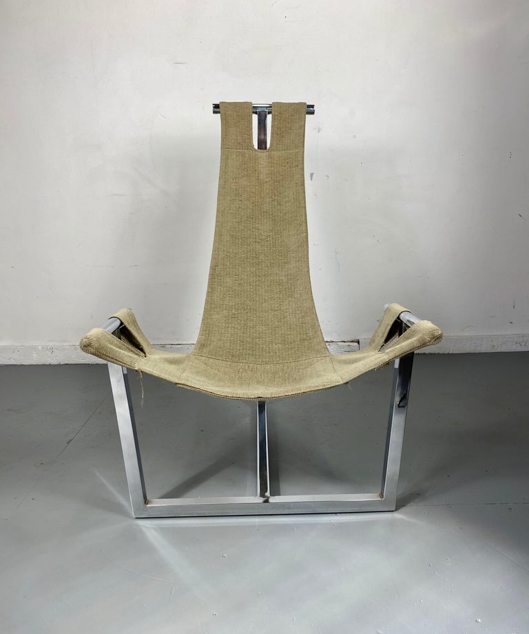 Modernist Space Age 1970s polished chrome sling lounge chair, amazing design, Classic 1960s.. 1970s styling, exceptional quality and construction, possible prototype ? cannot find designer or maker? Retains original celadon green fabric sling in