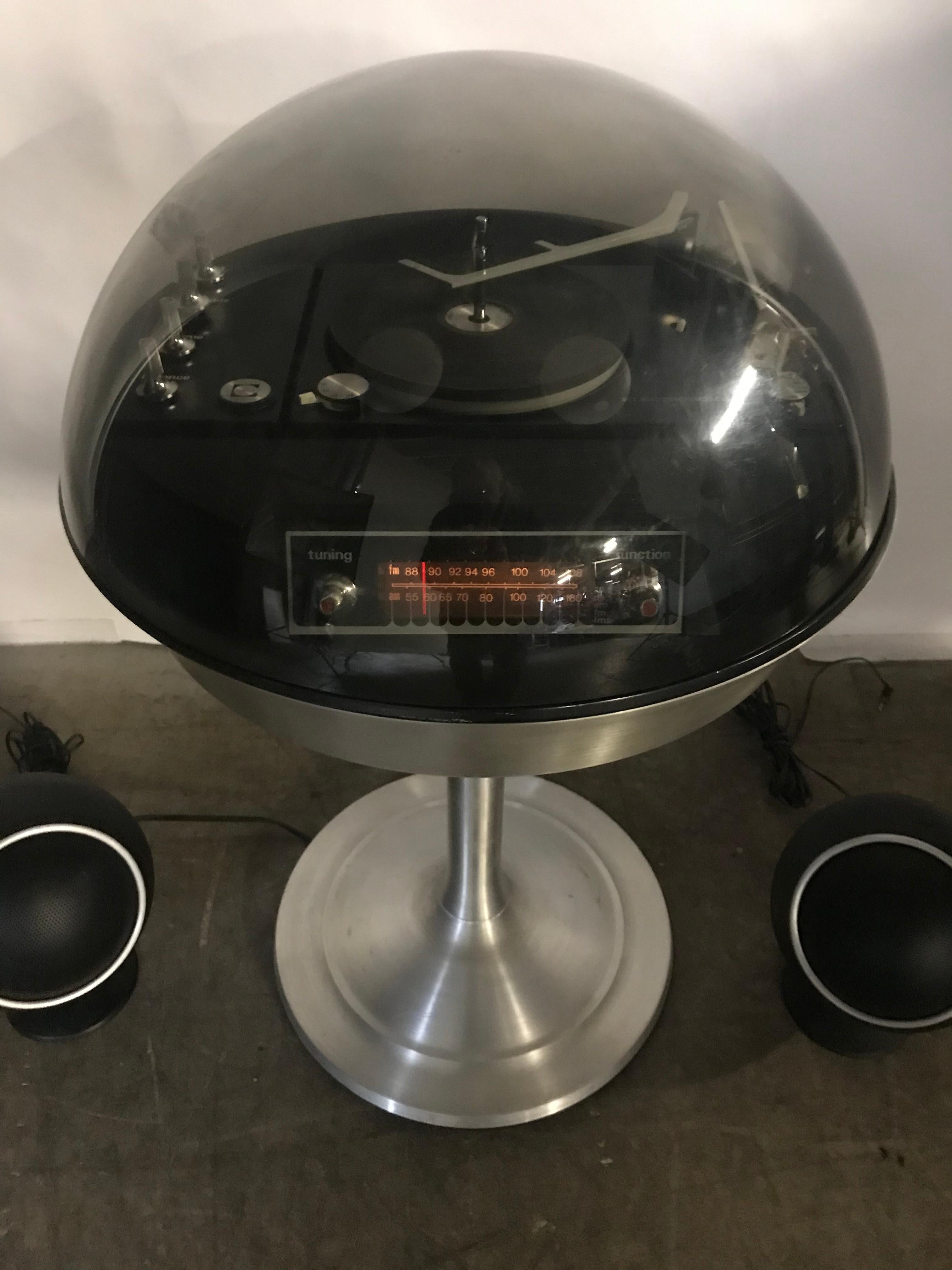 Modernist Space Age bubble top Apollo 860 Stereo/Record Player by Electrohome. Amazing original condition, smoke grey acrylic dome top on aluminum pedestal. Tested and working am/fm radio and turn table. Also retains original sphere, ball speakers.
