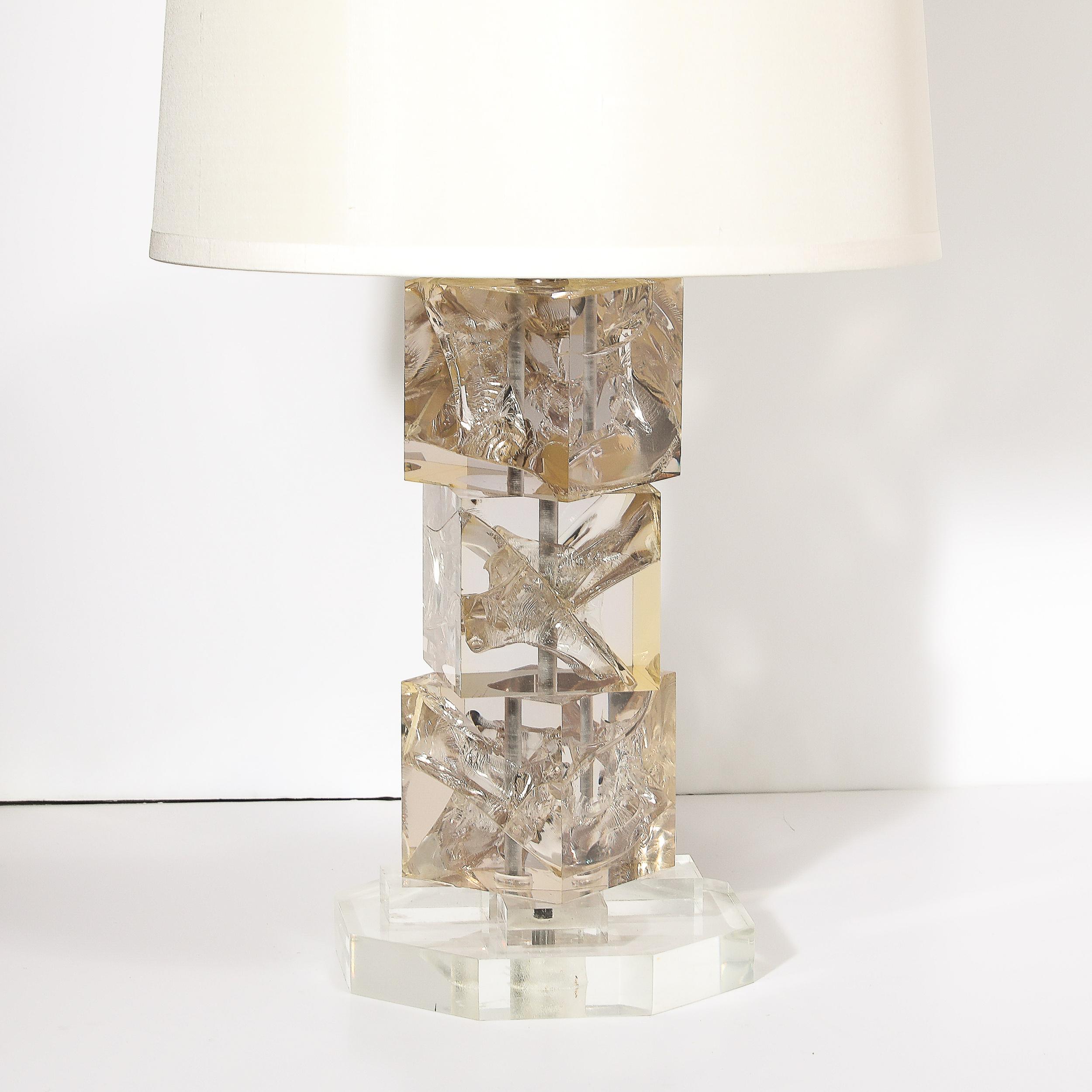 This geometric and beautifully detailed Modernist Stacked Ice Cube Table Lamp in Smoked Rose Lucite on Octagonal Base originates from the United States, Circa 1970. Features an octagonal base with the body of the lamp composed of three substantial