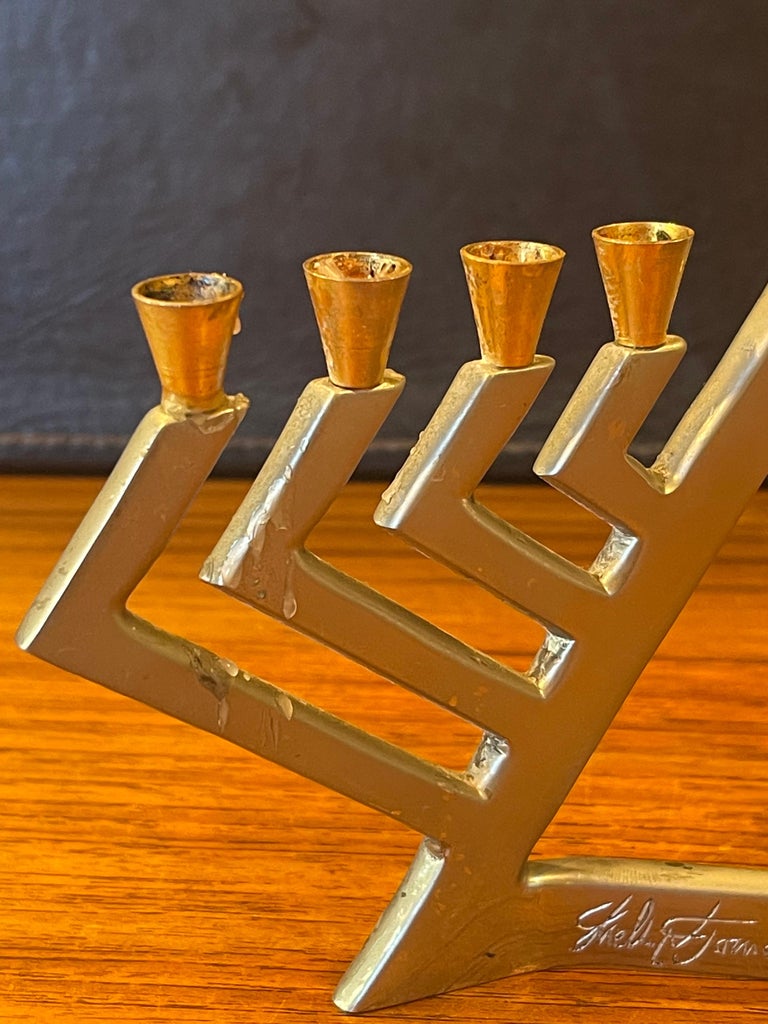 Modernist Stainless Steel and Brass Menorah by Shelly Turner for Alef Judaica For Sale at 1stDibs