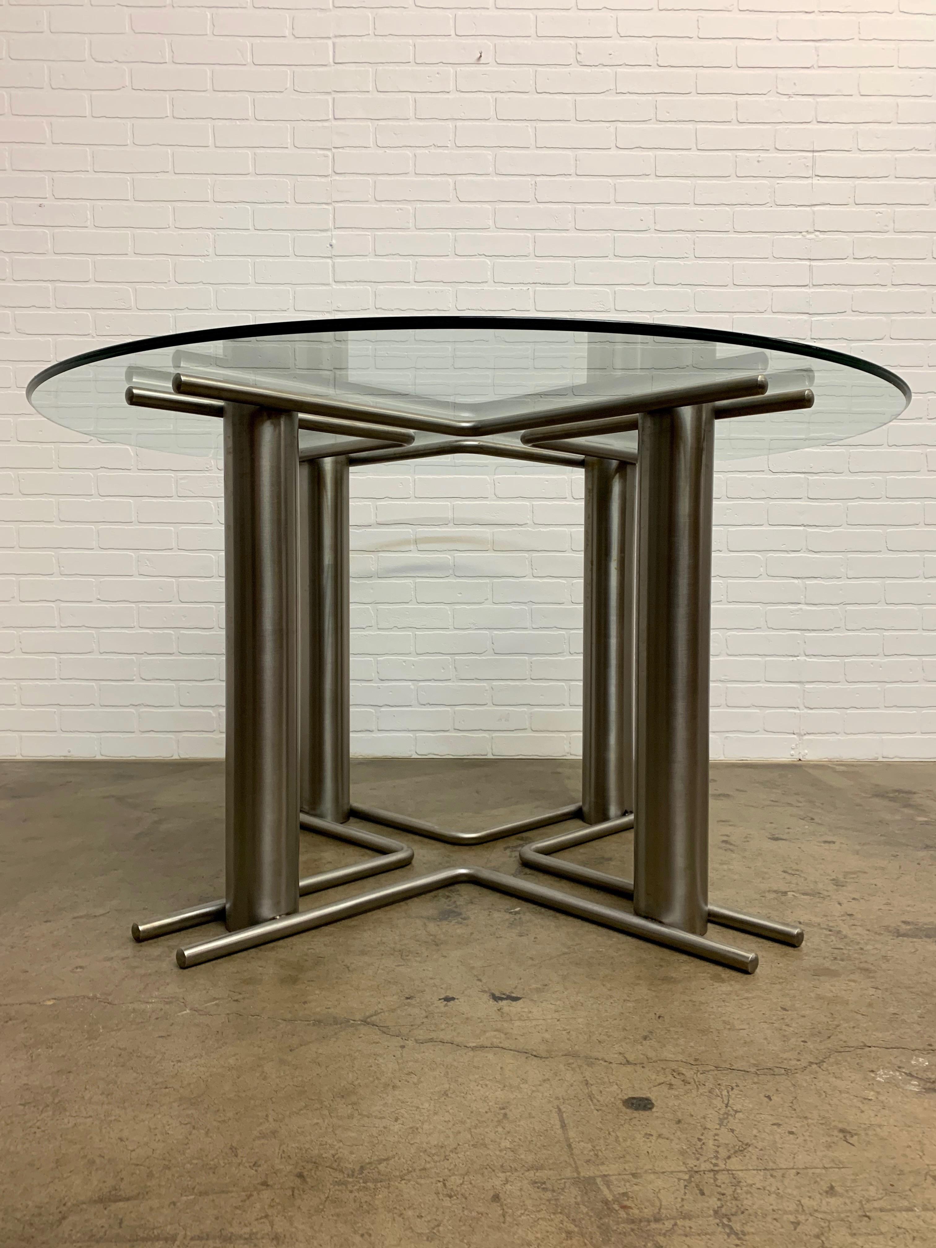 Very sturdy modern stainless steel dining table X-base. Glass is optional.