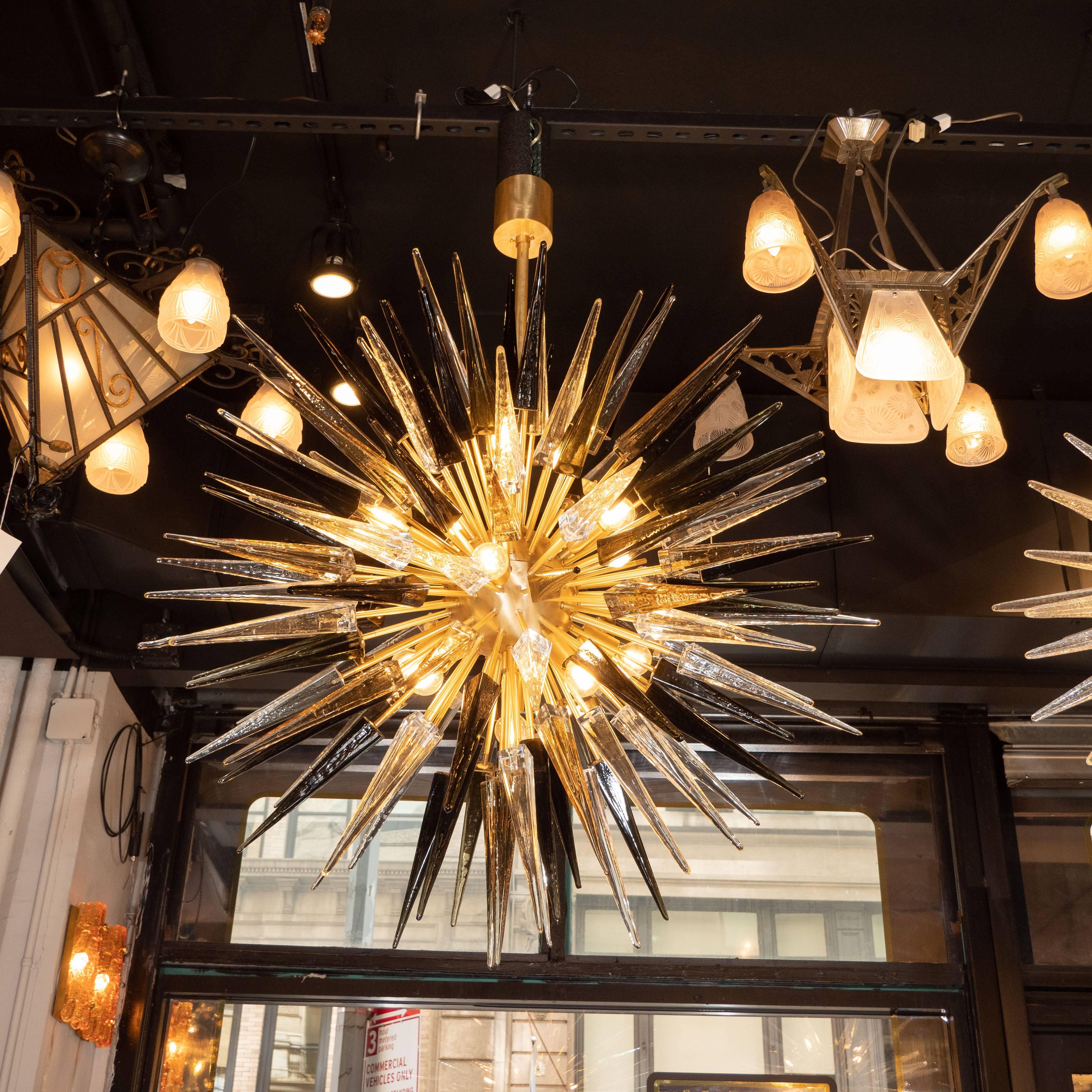 Brass Modernist Starburst Chandelier with Clear, Smoked and Graphite Glass Obelisks For Sale