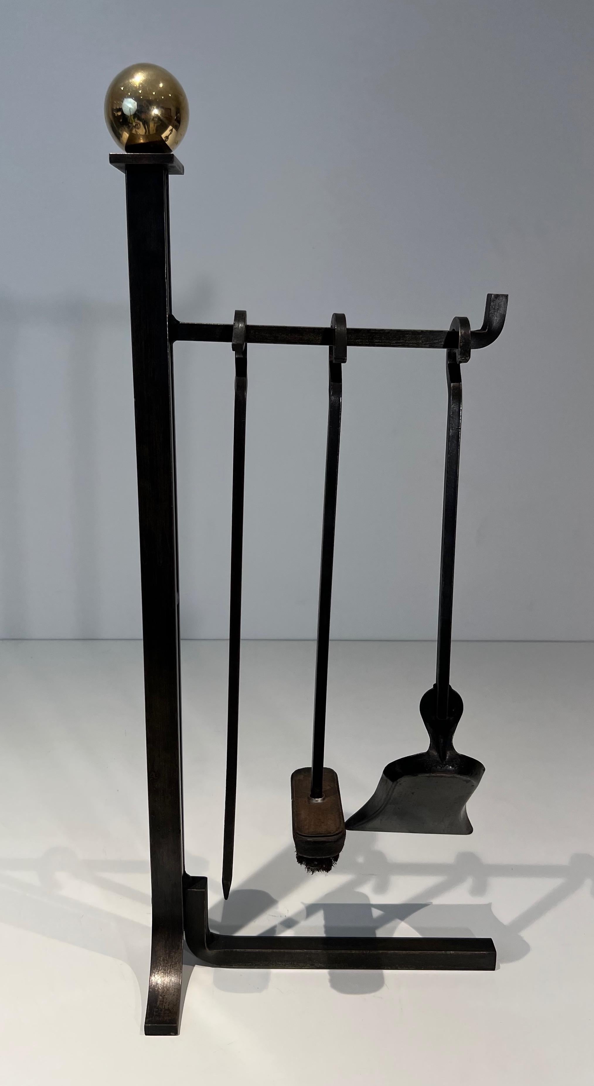 French Modernist Steel and Brass Fireplace Tools on Stand in the Style of Jacques Adnet For Sale