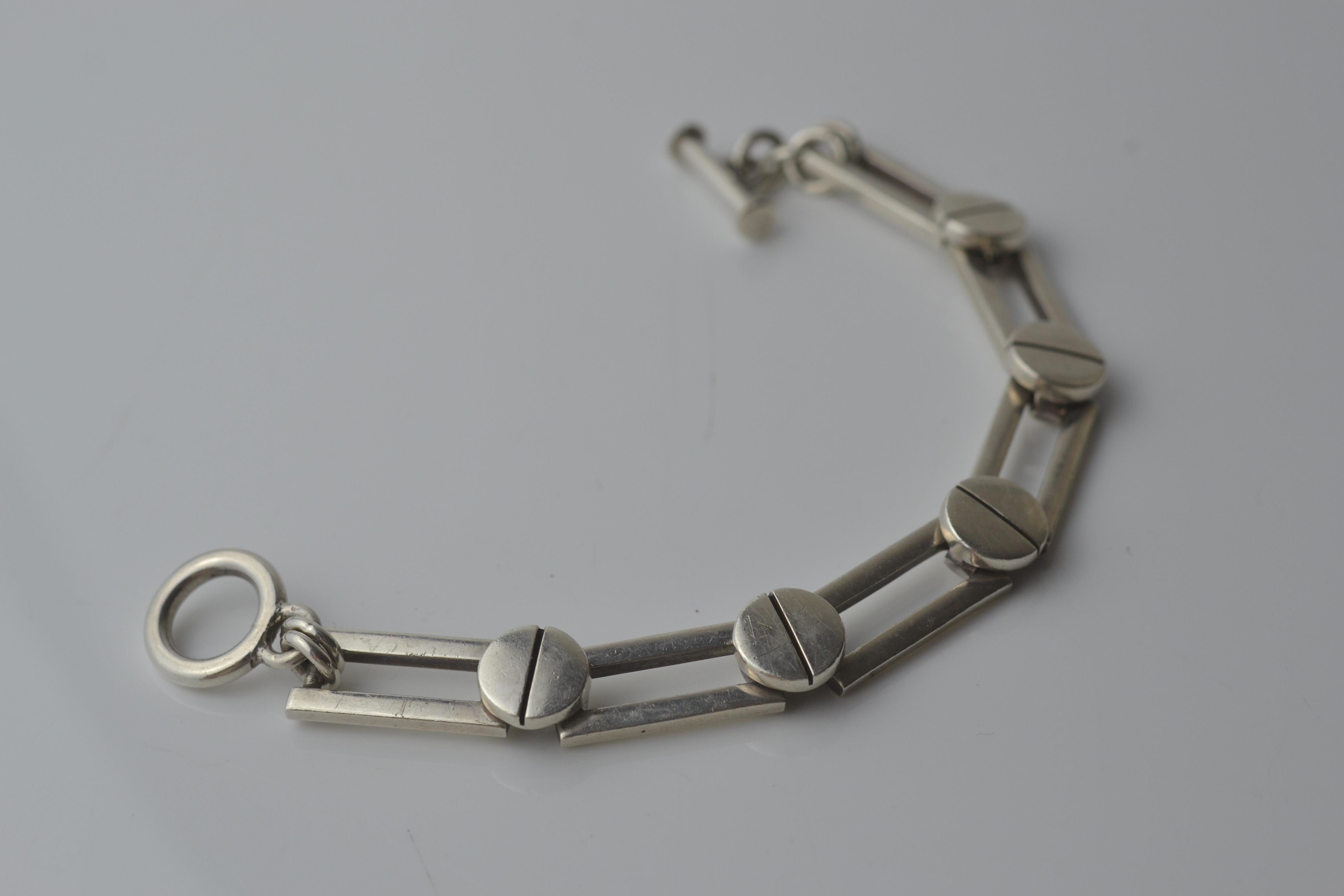 This chunky and beautifully made heavy 51.9 g sterling silver bracelet was bought in Mexico and is around twenty years old.  It would suit either sex, measures 8 inches in length, hence suit a 7