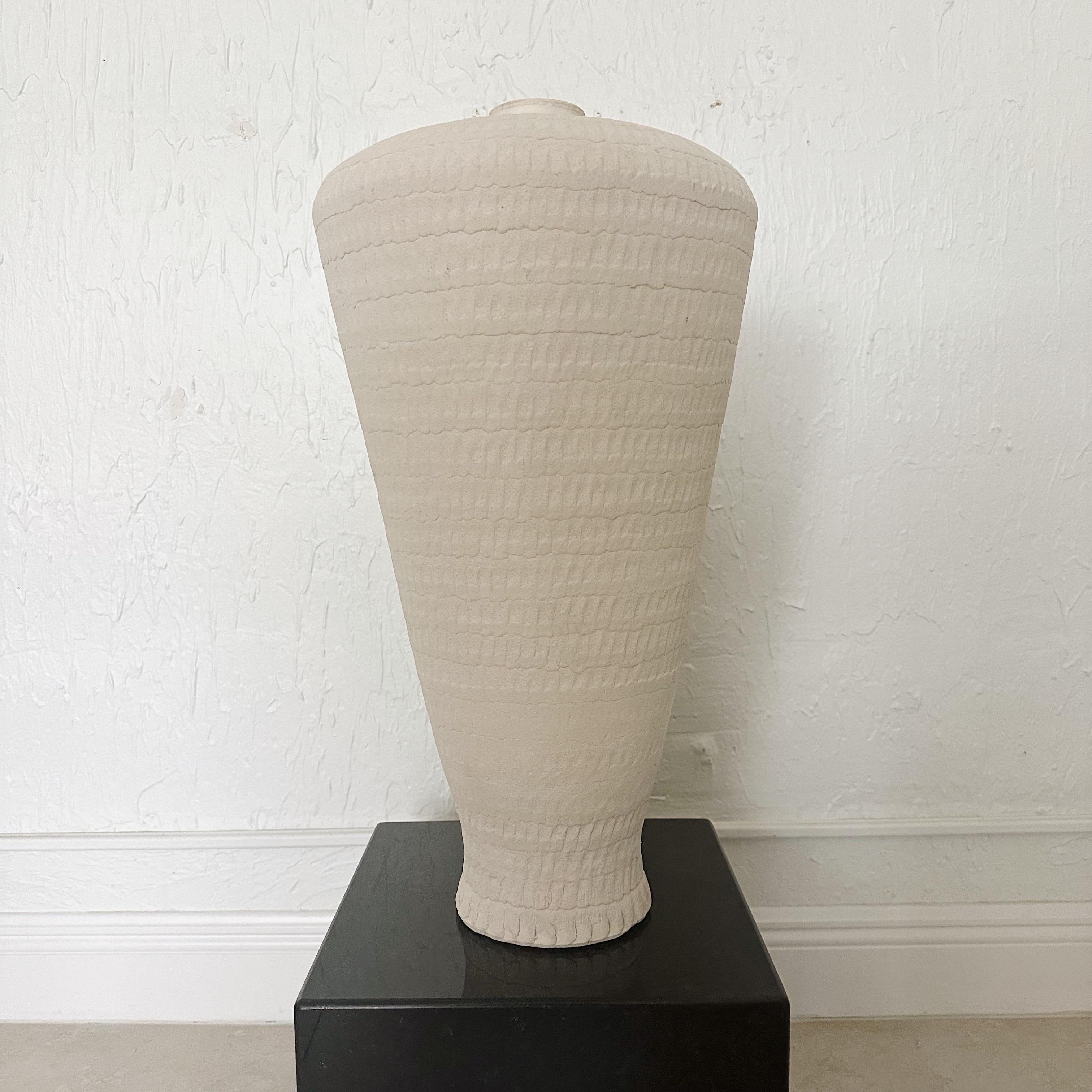 Tall textured white studio pottery vase vessel by ceramicist Guy Dawson. Signed Guy Dawson. Circa 1970's.