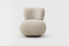 Modernist swivel armchair "Ju" in fabric