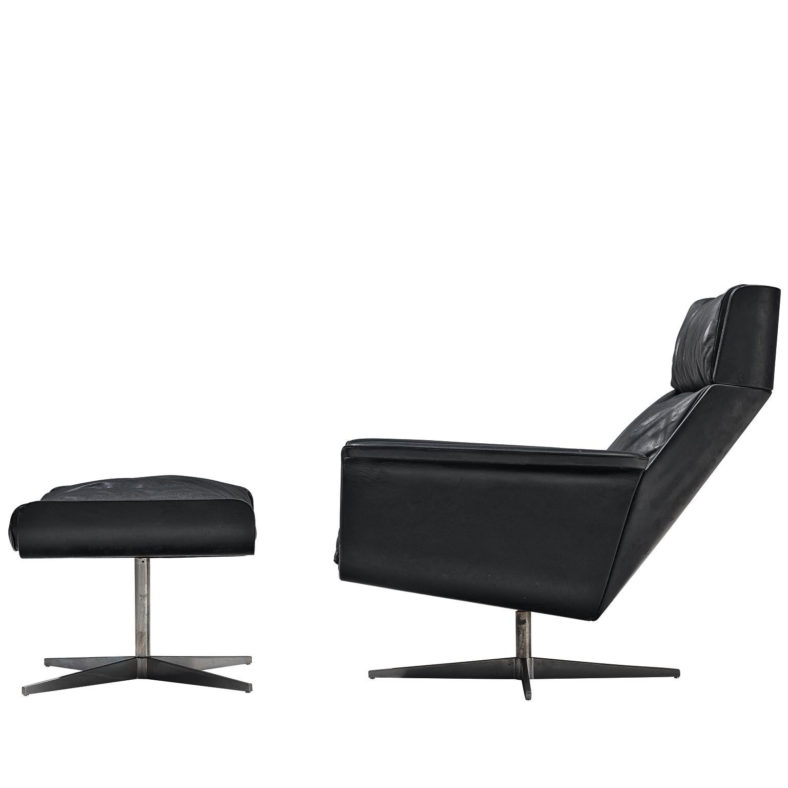 Modernist Swivel Lounge Chair with Ottoman in Black Leather at 1stDibs