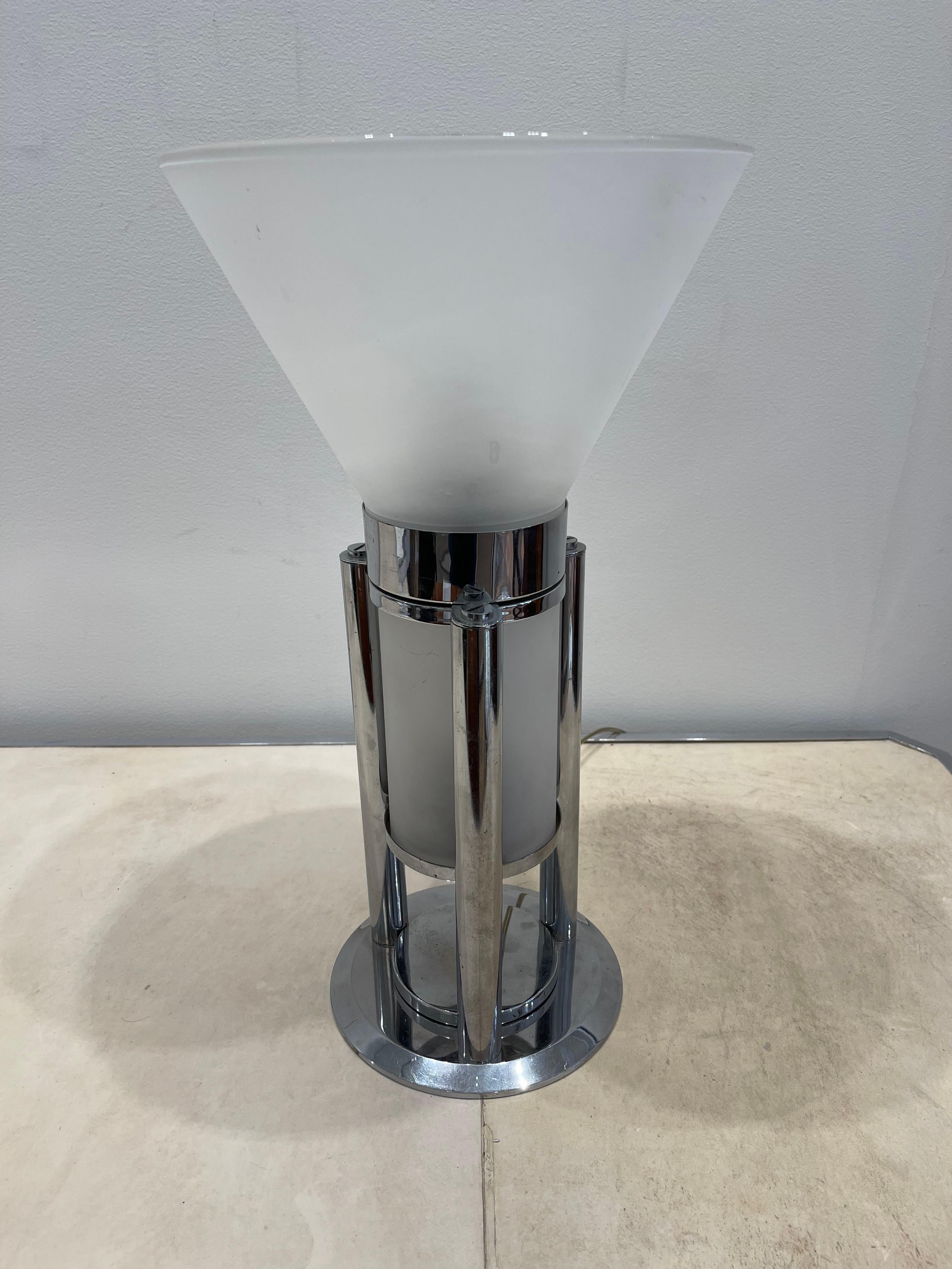 Superb modernist table lamp by Jean-Boris Lacroix. This lamp was produced by Mitis a leading French design studio during the art deco period. It is made of Chromed metal and sandblasted glass. It has 2 light bulbs : one in the bottom glass cylinder