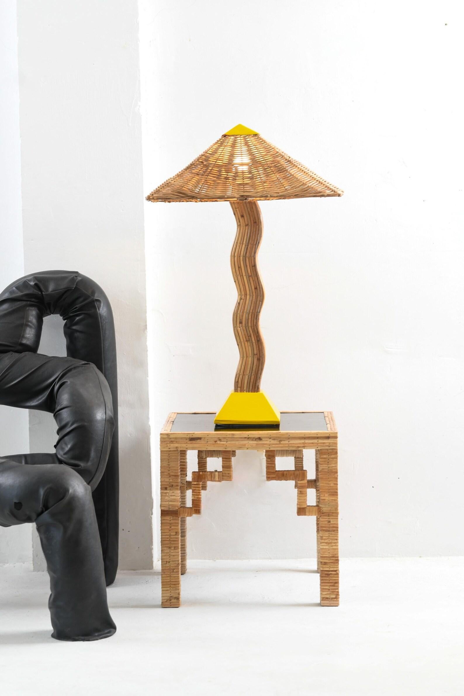 The Pallete Table Lamp distills the bold, organic-meets-geometric appeal of its floor lamp counterpart into a refined, space-saving design. Perfect for desks, bedside tables, or console settings, this lamp retains the signature Mid-Century Modern