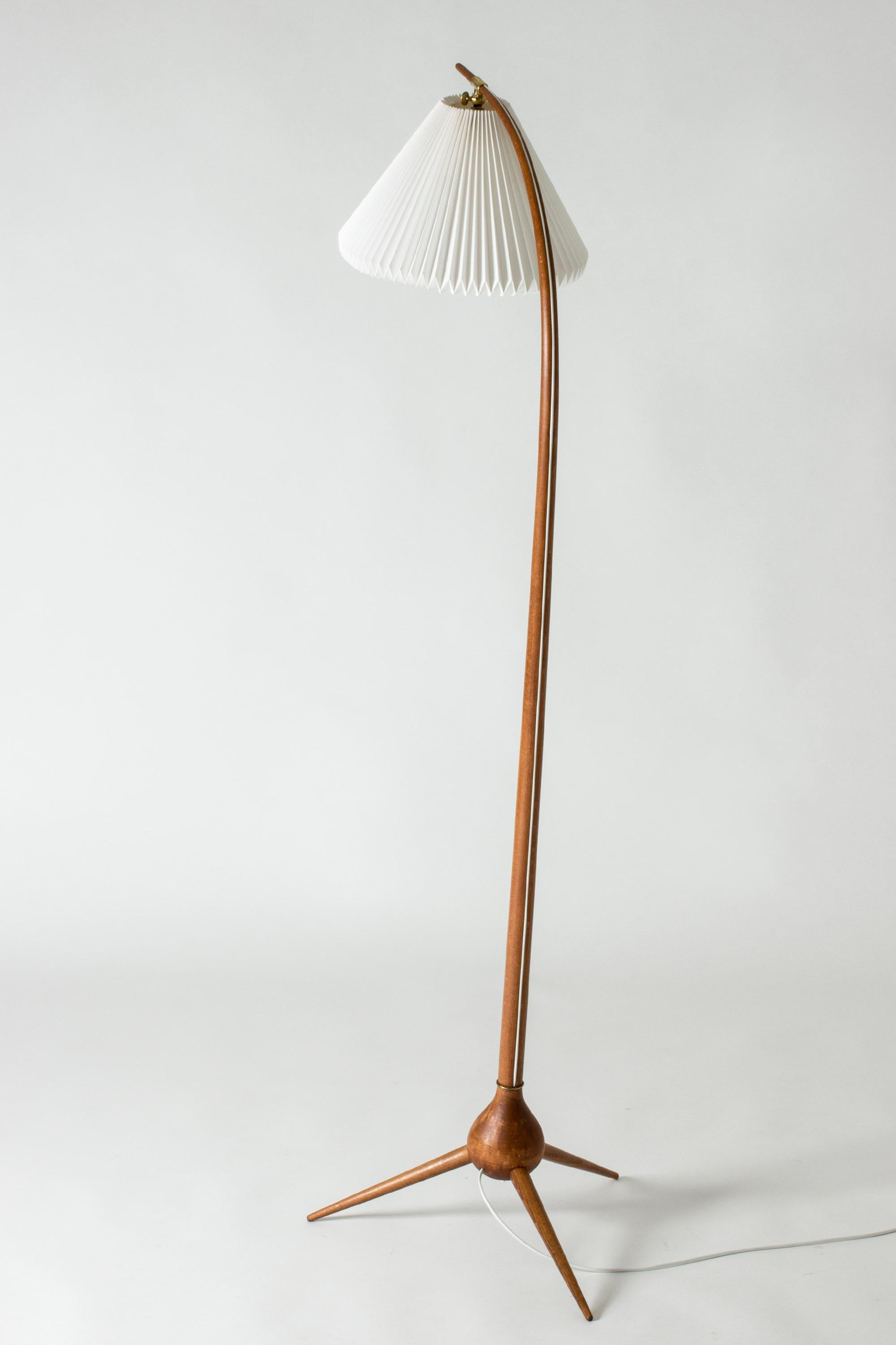 Amazing “Bridge” floor lamp by Severin Hansen. The stem is made from teak bent into an elegant curve, with the cord visible running along the back. Three feet in an onion-shaped joint with a brass detail. Beautiful, organic design, Le Klint lamp