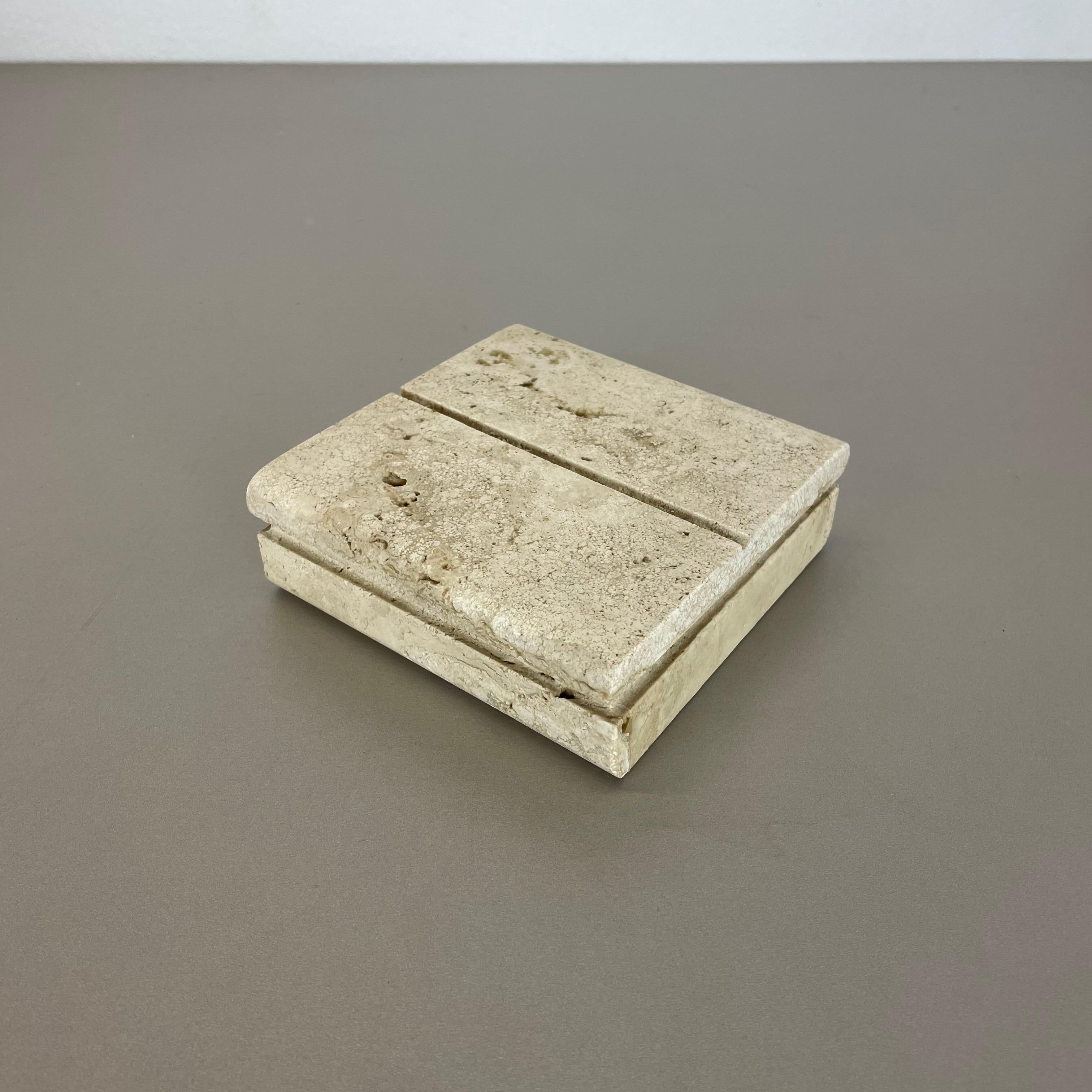Article:

Travertine stroge box storage box


Designer:

Fratelli Manelli


Decade:

1970s


This original vintage storage object was designed and produced by Fratelli Manelli in Italy in the 1970s. this element is made of solid