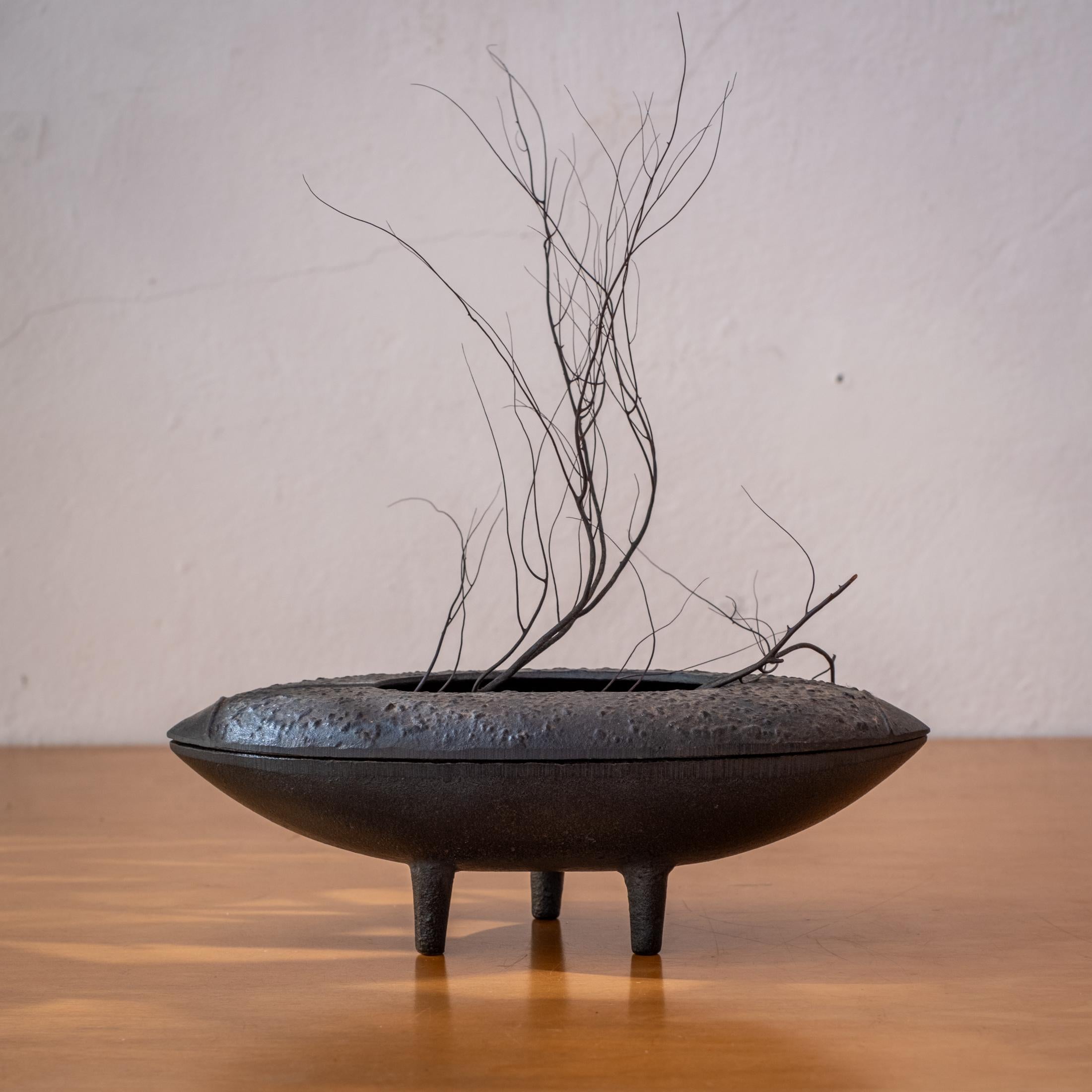 Mid-Century Modernist iron Ikebana tripod planter from Japan. Wonderful patina. Includes a flower frog in the original box. It could also be used as an incense burner. Japan, 1950s