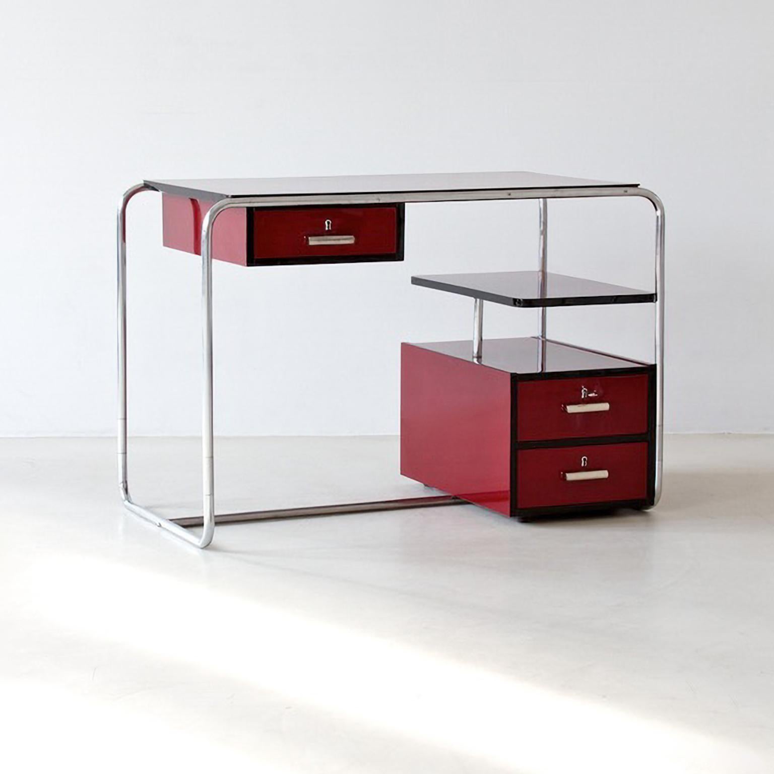 Modernist tubular steel desk in glossy lacquered wood and plated metal, c. 1950.
The wood finish is customizable, delivery time c. 8-12 weeks.