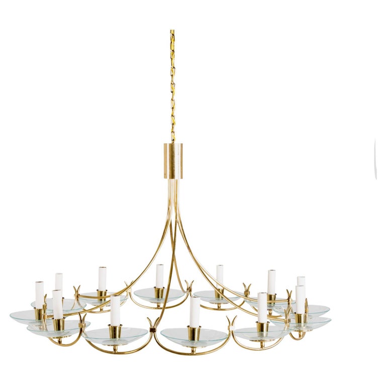 Lustre moderniste à douze lumières en laiton En vente sur 1stDibs