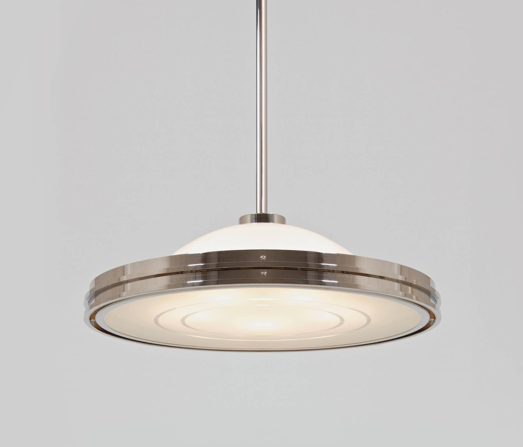 Modernist UFO pendant light made of nickel-plated brass and etched opal glass, customizable.
Production time: c. 10 weeks.