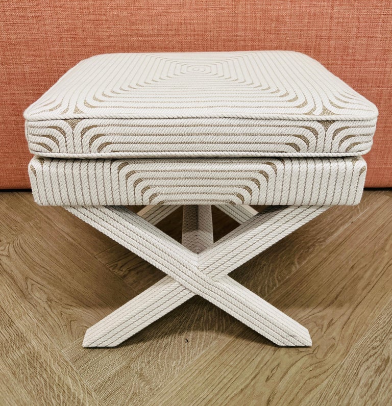 Grégoire upholstered bench by La Maison Pierre Frey, featuring a modernist X-frame design. Upholstered in a gorgeous woven jacquard fabric designed by Christian Astuguevieille for Pierre Frey. The fabric has a winding rope pattern with interlaced