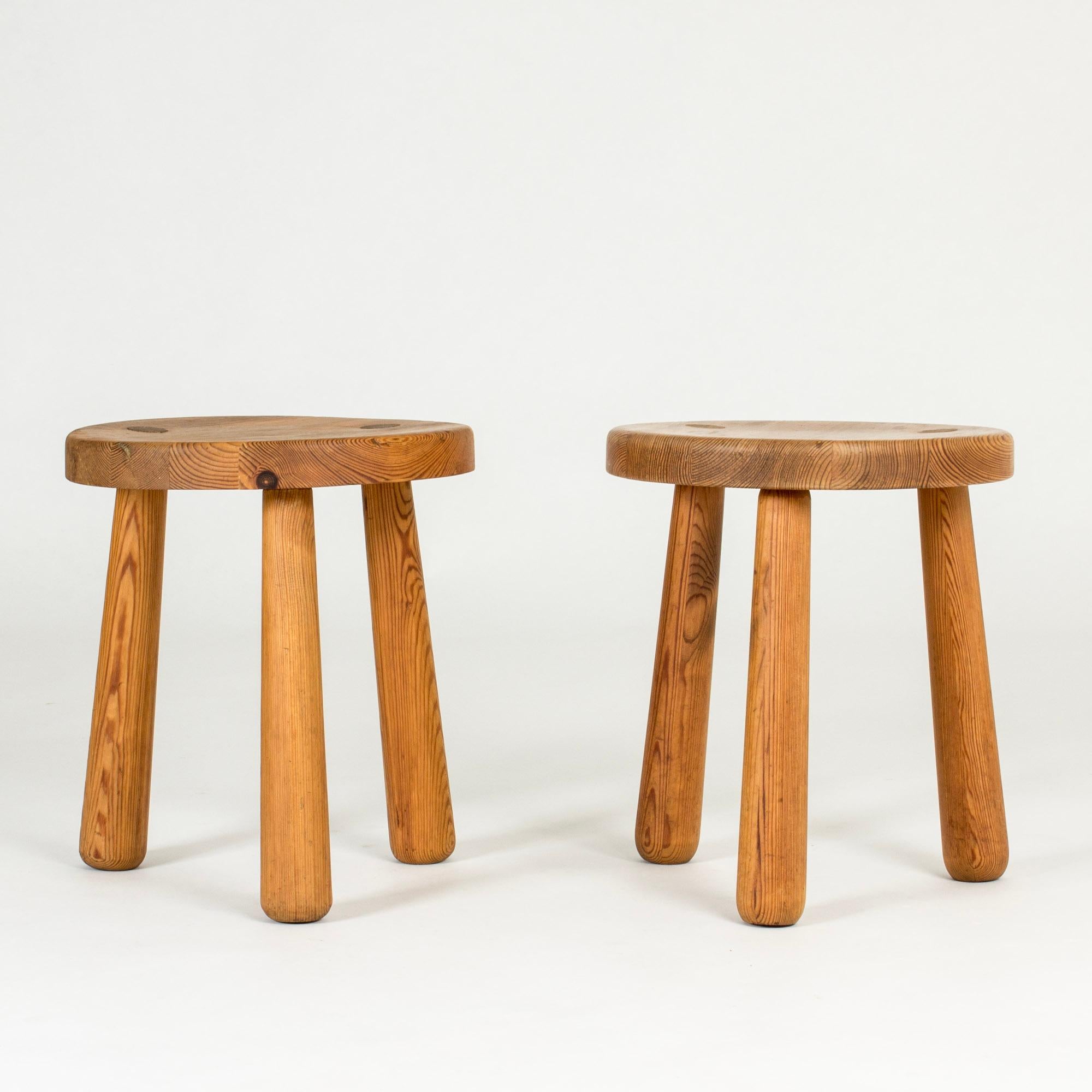 Pair of “Utö” stools by Axel Einar Hjorth, made from pine. Rustic design, decorative spheres on the seats.

“Utö” is one of the series of furniture included in NK:s “Sporstugemöbler”, “sports cabin’s furniture”. Axel Einar Hjorth designed them in