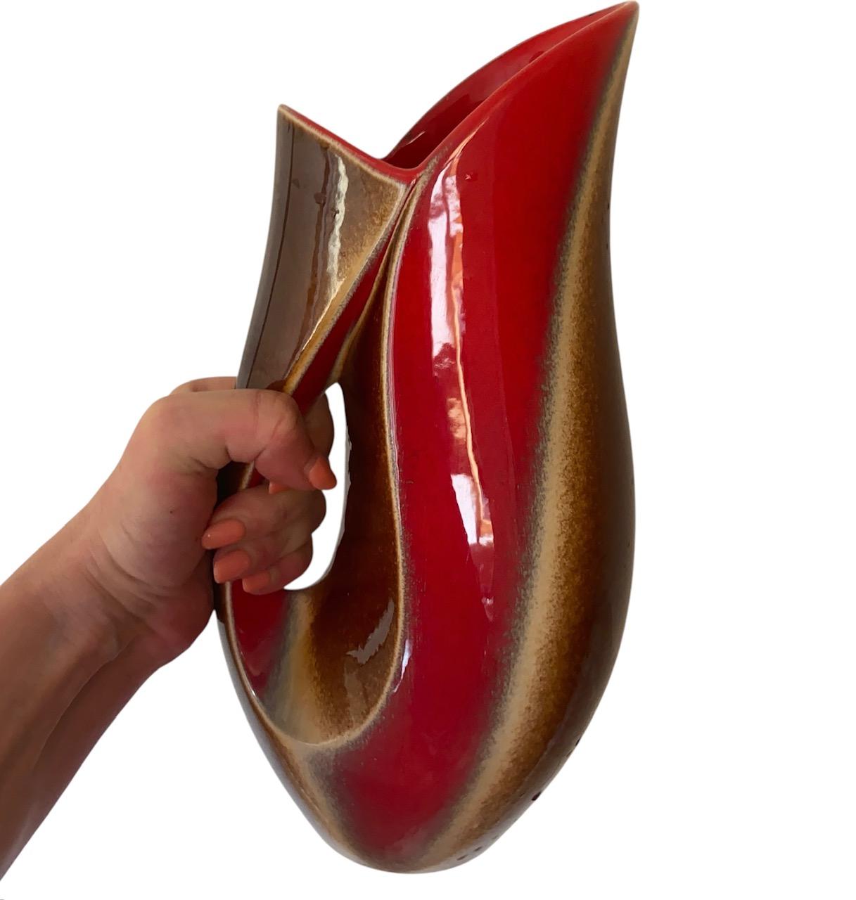 VERCERAM Ceramic of Montreuil (near Paris) is famous for its pearly and iridescent ceramics and existed between 1930 and 1971.

A hallmark identifies the brand: a V in an oval with the words MADE IN FRANCE written on it.

Each model has its own