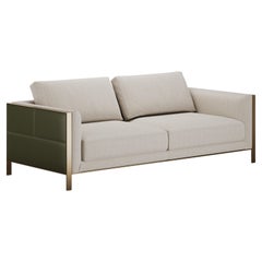 Divano Verve modernista con gambe in metallo