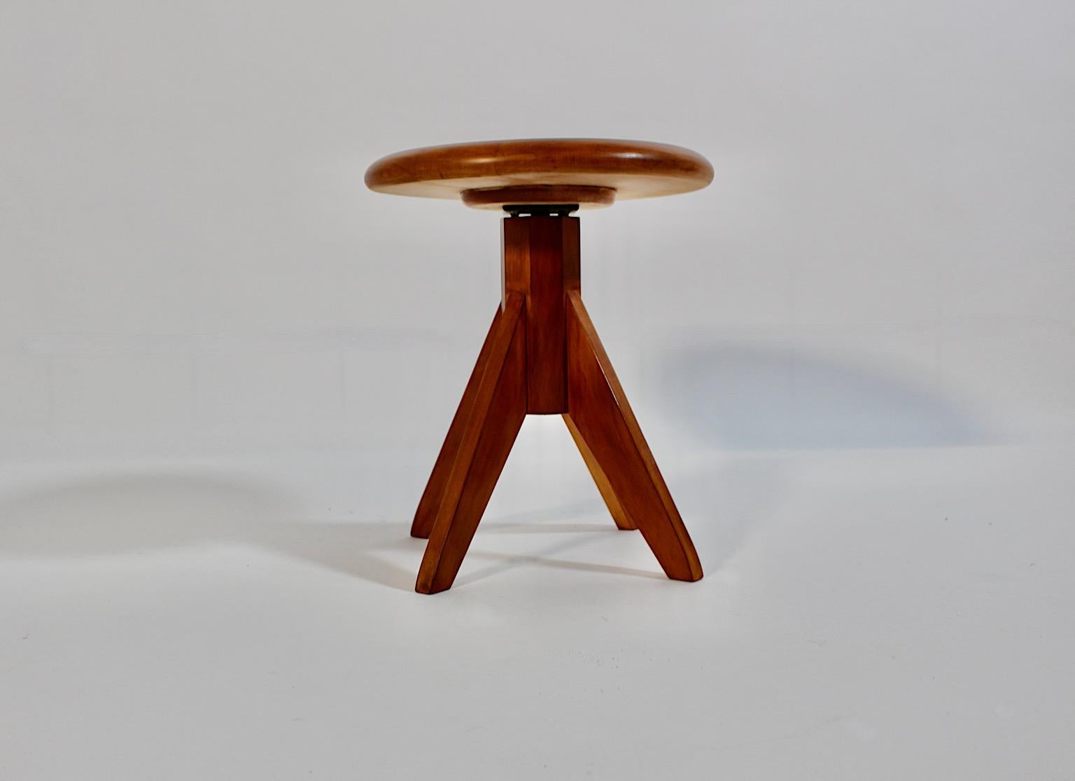 Modernist vintage swiveling stool from beech shellac polished with a metal spindle and a curved seat, 1970s Austria.
A beautiful Art Deco style stool from beech, stained to cherrywood color tone with a metal spindle and a curved seat.
With four ( 4
