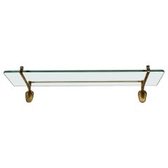 Estantería modernista vintage de latón y cristal años 50 Italia