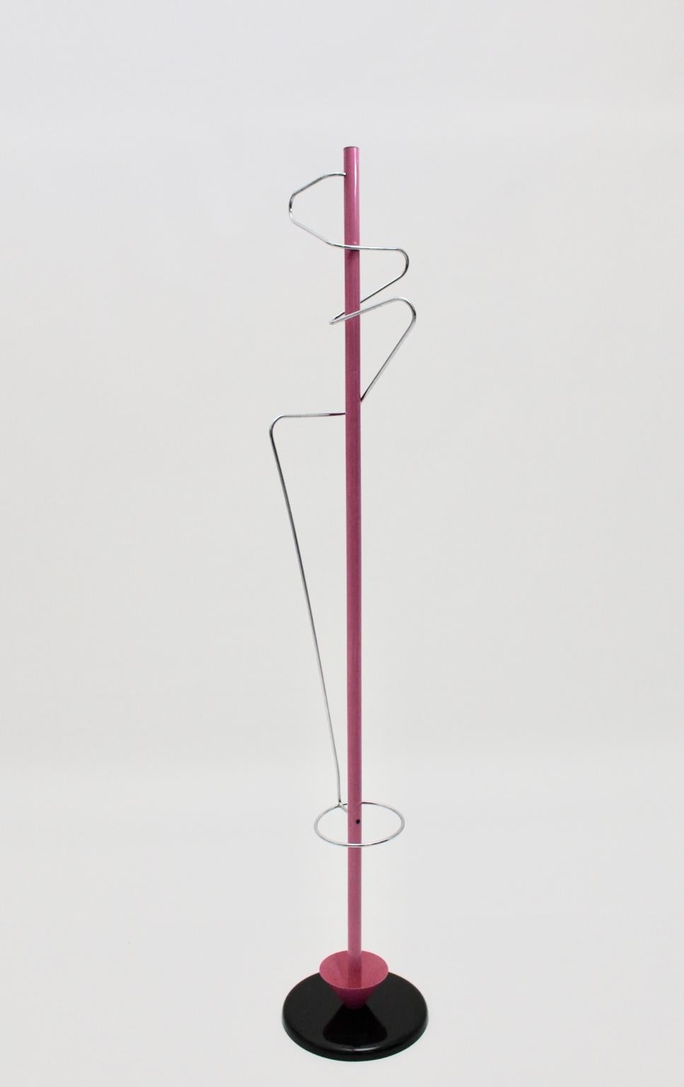 The coat rack with an integrated umbrella stand was designed and made in the 1980s. The coat rack was made of tube steel pink and black lacquered and chromed metal.
Very good condition with minor signs of age.
Approximate measures:
Height 178.5