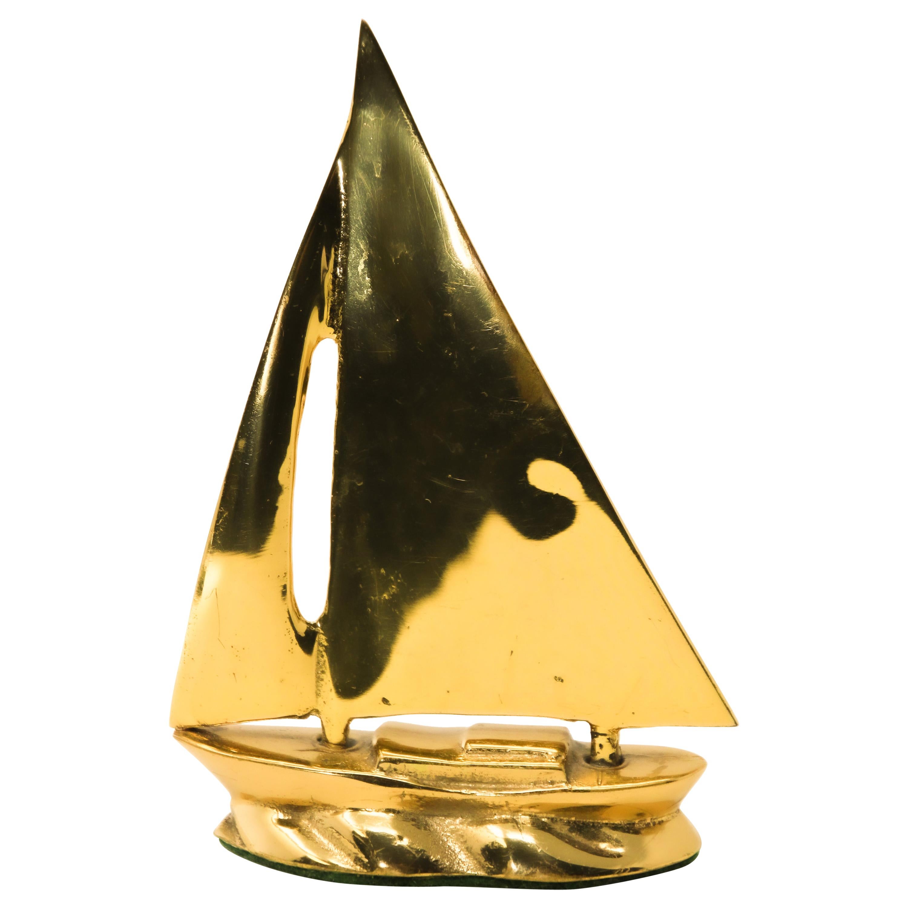 vintage brass sailboat