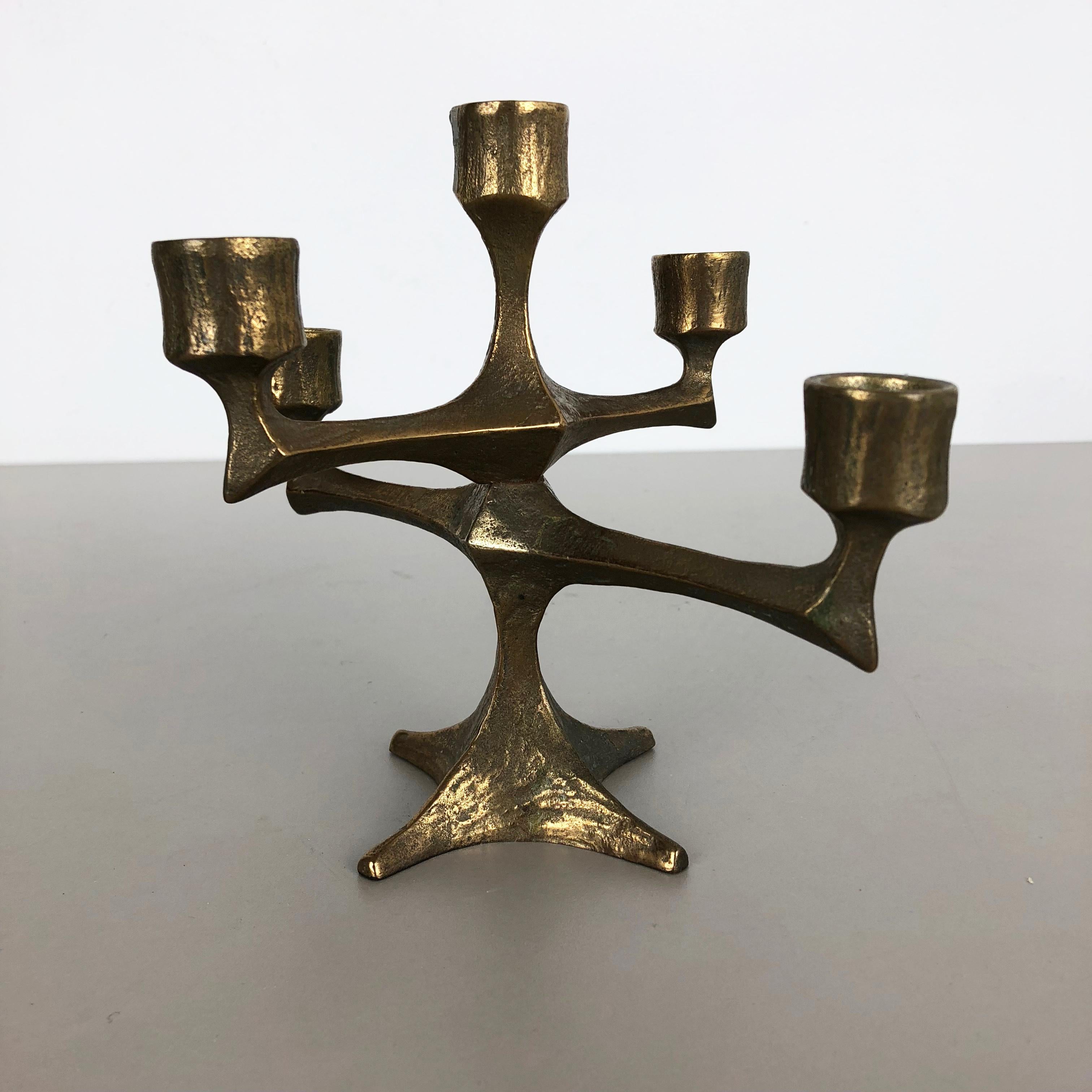 Article:

Brutalist candleholder


Origin:

France


Material:

solid bronze


Decade:

1970s


This original vintage candleholder, was produced in the 1970s in France. It is made of solid bronze, and has a lovely patination due