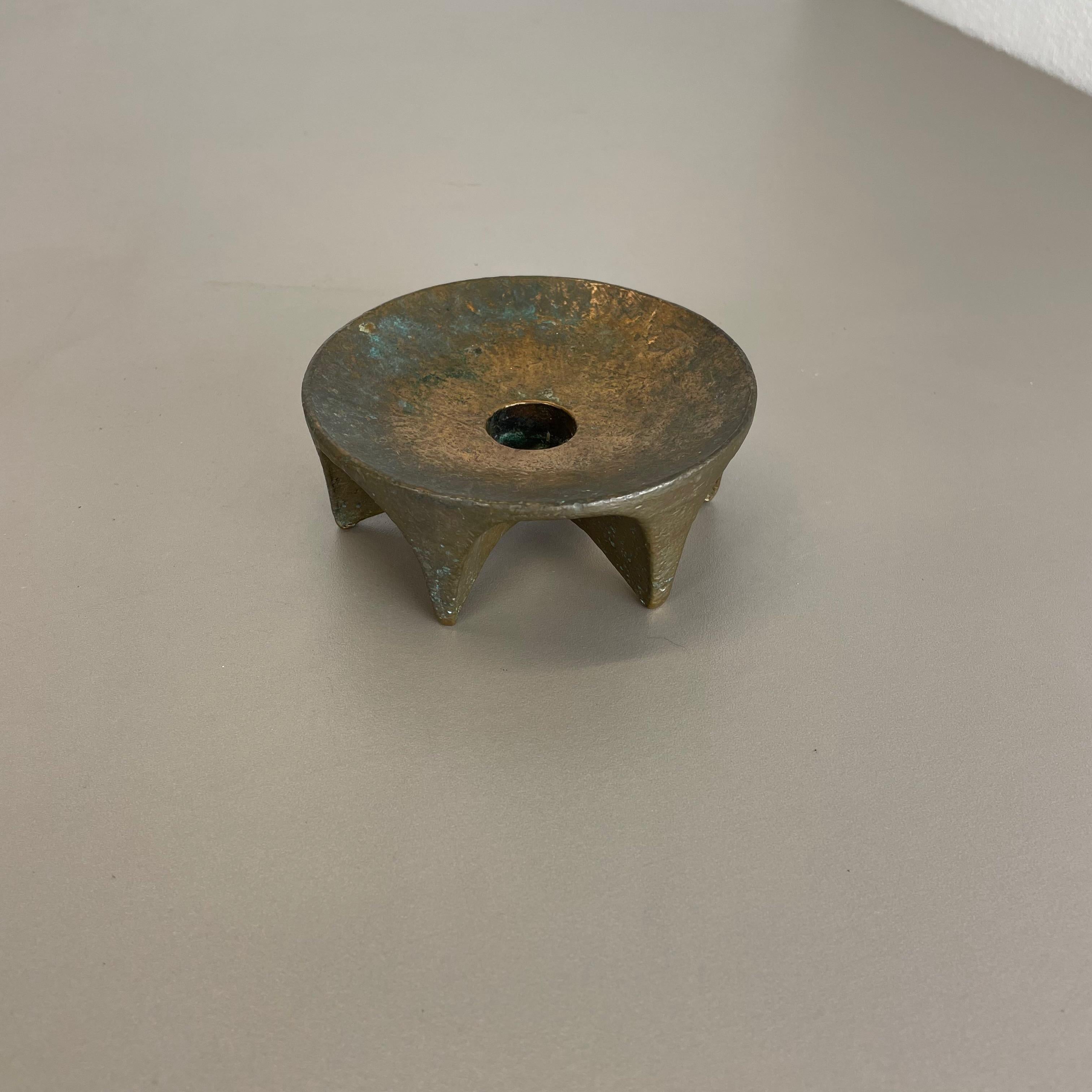 Article:

Brutalist candleholder


Origin:

France


Material:

solid bronze


Decade:

1970s


This original vintage candleholder, was produced in the 1970s in France. It is made of solid bronze, and has a lovely patination due to the age of about