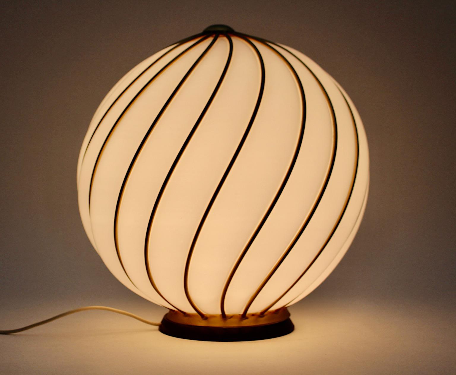 Mid Century Modern vintage huge floor lamp or table lamp by VeArt from white glass and brass plated metal rods 1960s Italy.
A formidable and beautiful lighting, which shows a wonderful huge white glass body from Murano glass for Veart in white color