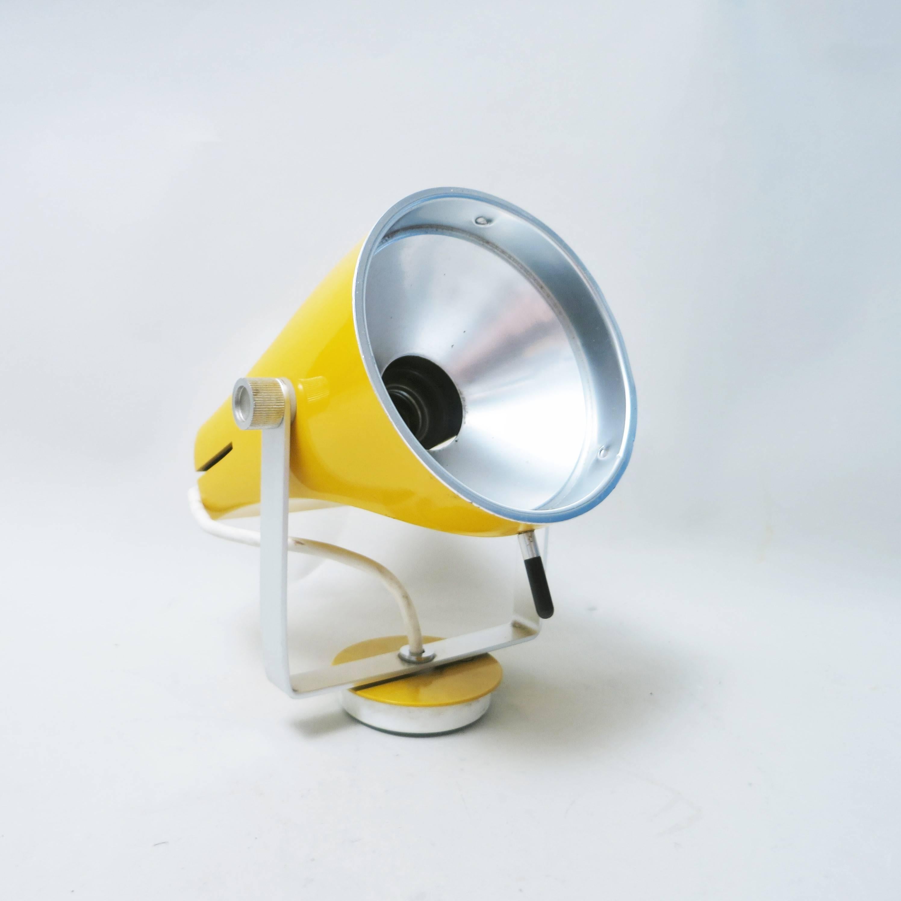 Modernist orientable yellow wall lamp designed by Etienne Fermigier and produced by Disderot in 1967 in France.