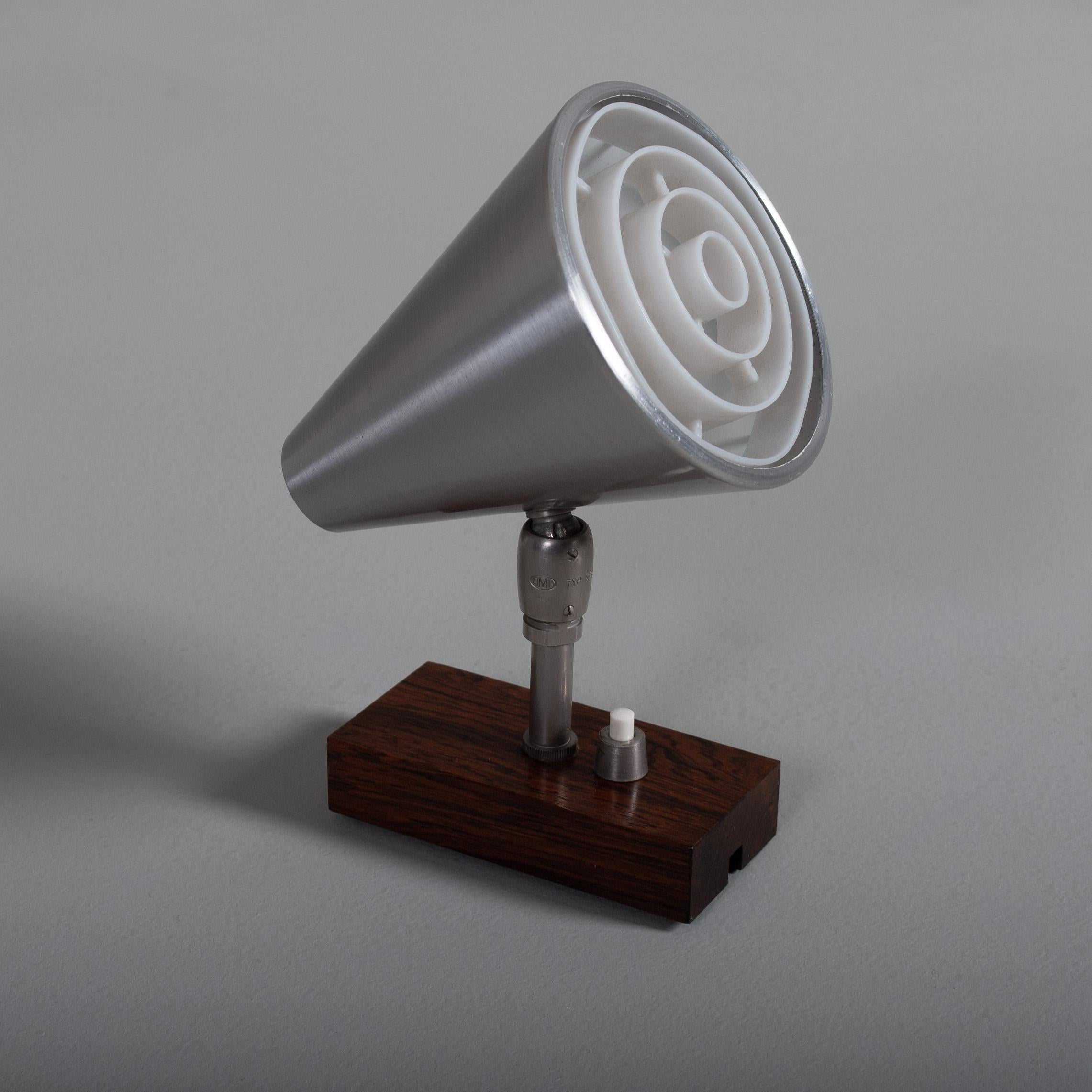 Cutest little wall lamp from Scandinavia circa 1960. Can be hardwired into existing wall lighting circuit or with a cable to plug outlet (please notify preferred option). 
Adjustable ball jointed metal shade and built in on/off switch.
Can be used