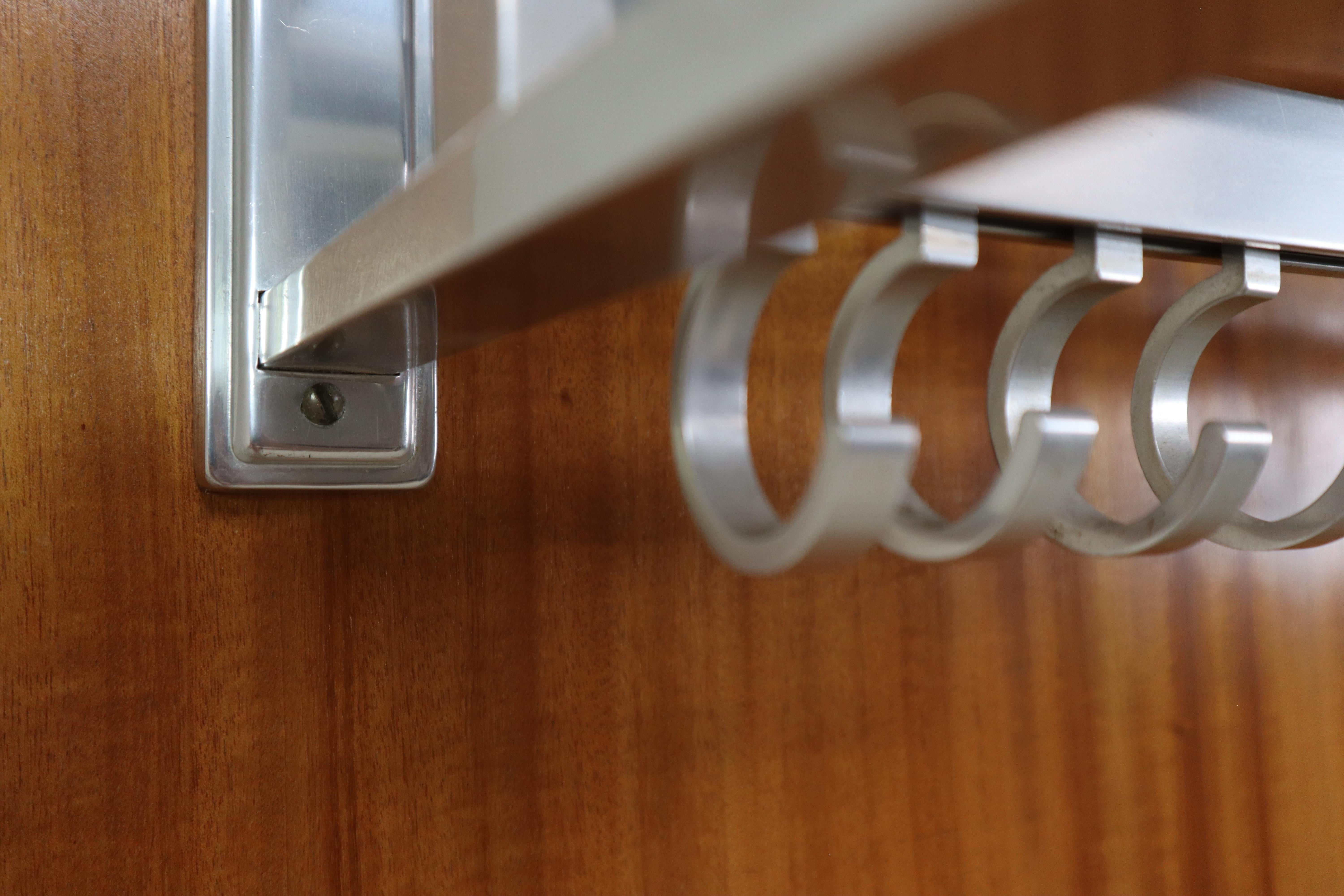 Plated Modernist wall-mounted cloakroom in Teak, Aluminium & Nickel-plated Brass, 1950s For Sale