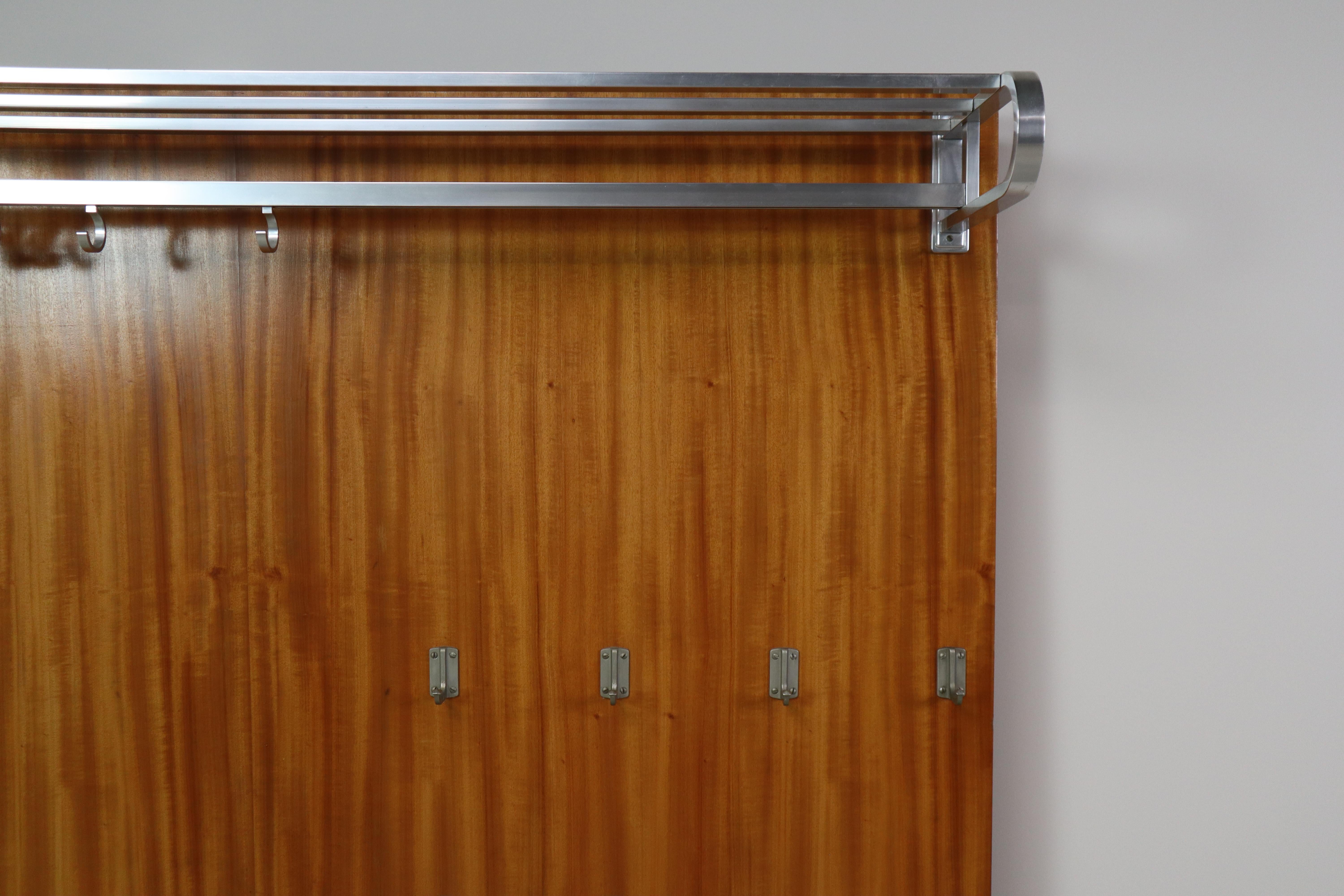 Aluminum Modernist wall-mounted cloakroom in Teak, Aluminium & Nickel-plated Brass, 1950s For Sale