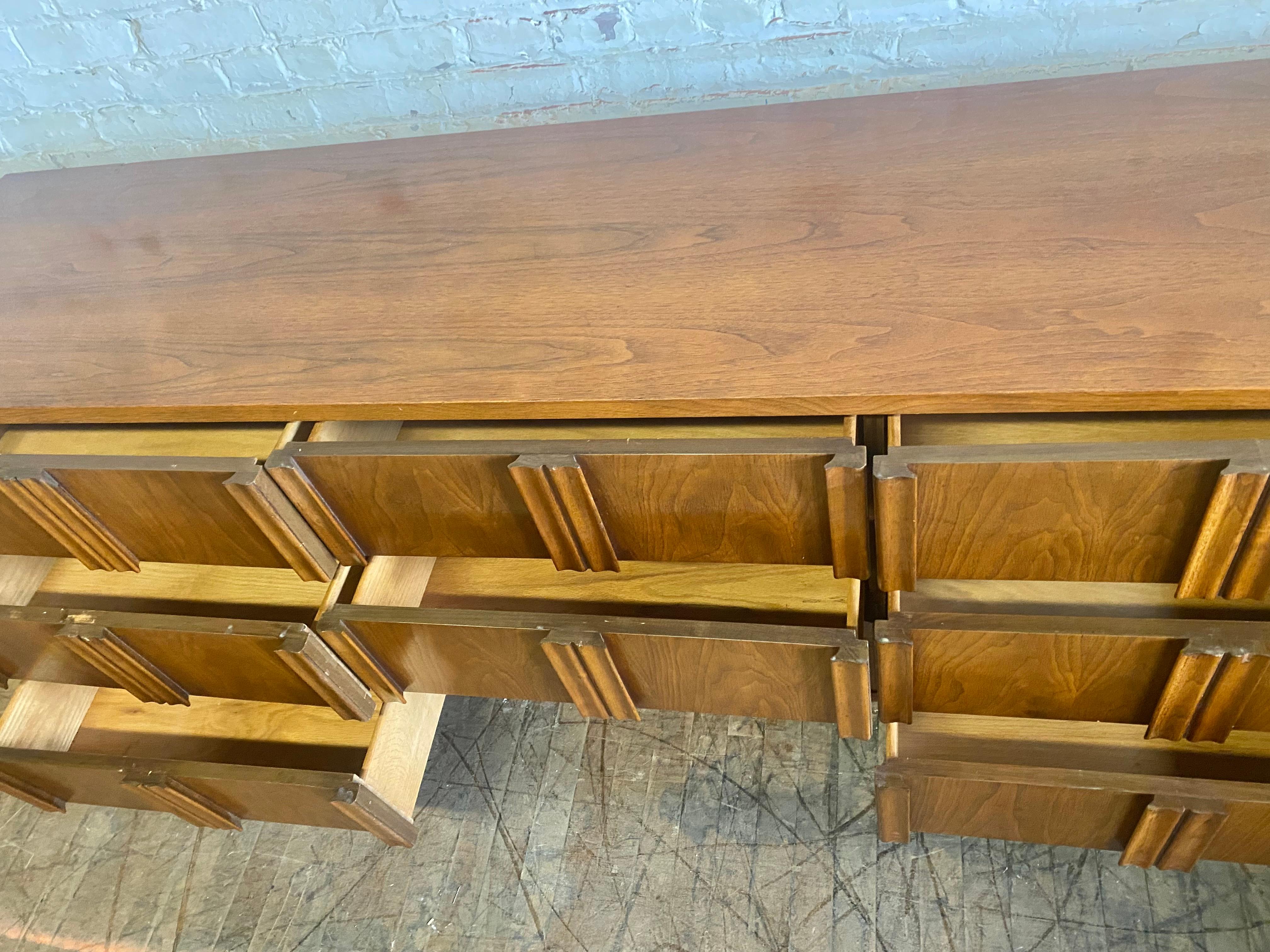 Mid-20th Century Modernist Walnut 9 Drawer Dresser by American of Martinsville