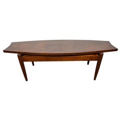 Modernist Walnut Cocktail / coffee table / floating top with drawer