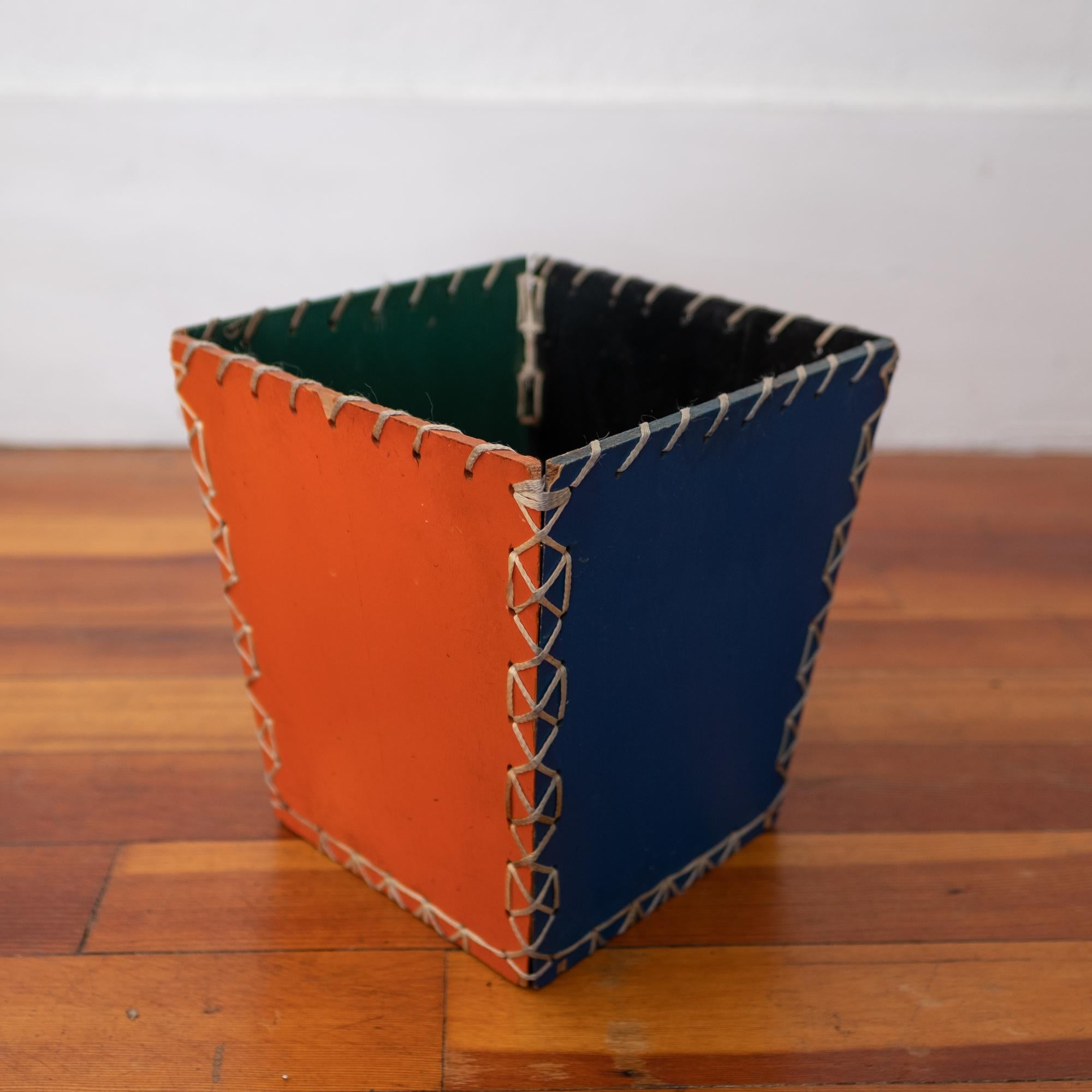 Bauhaus and/or Eames influenced trash can from the 1950s. Constructed with rope and masonite.