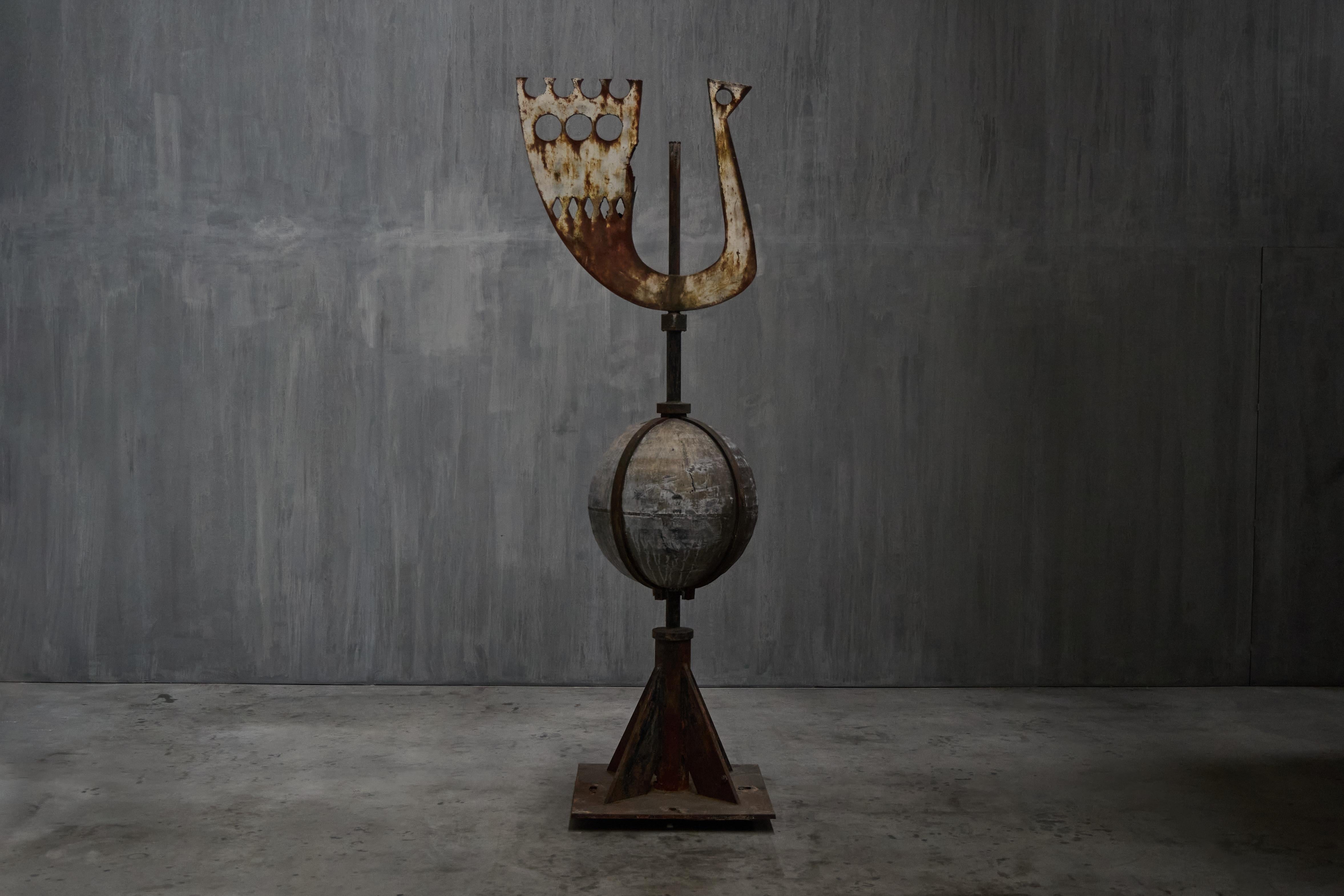 This striking abstract sculpture, interpreted as a modernist weathercock rooster, was originally installed atop the Pius X Parish Church in Amsterdam’s Slotervaart district. Designed in the late 1950s and completed in 1960, the church represents a