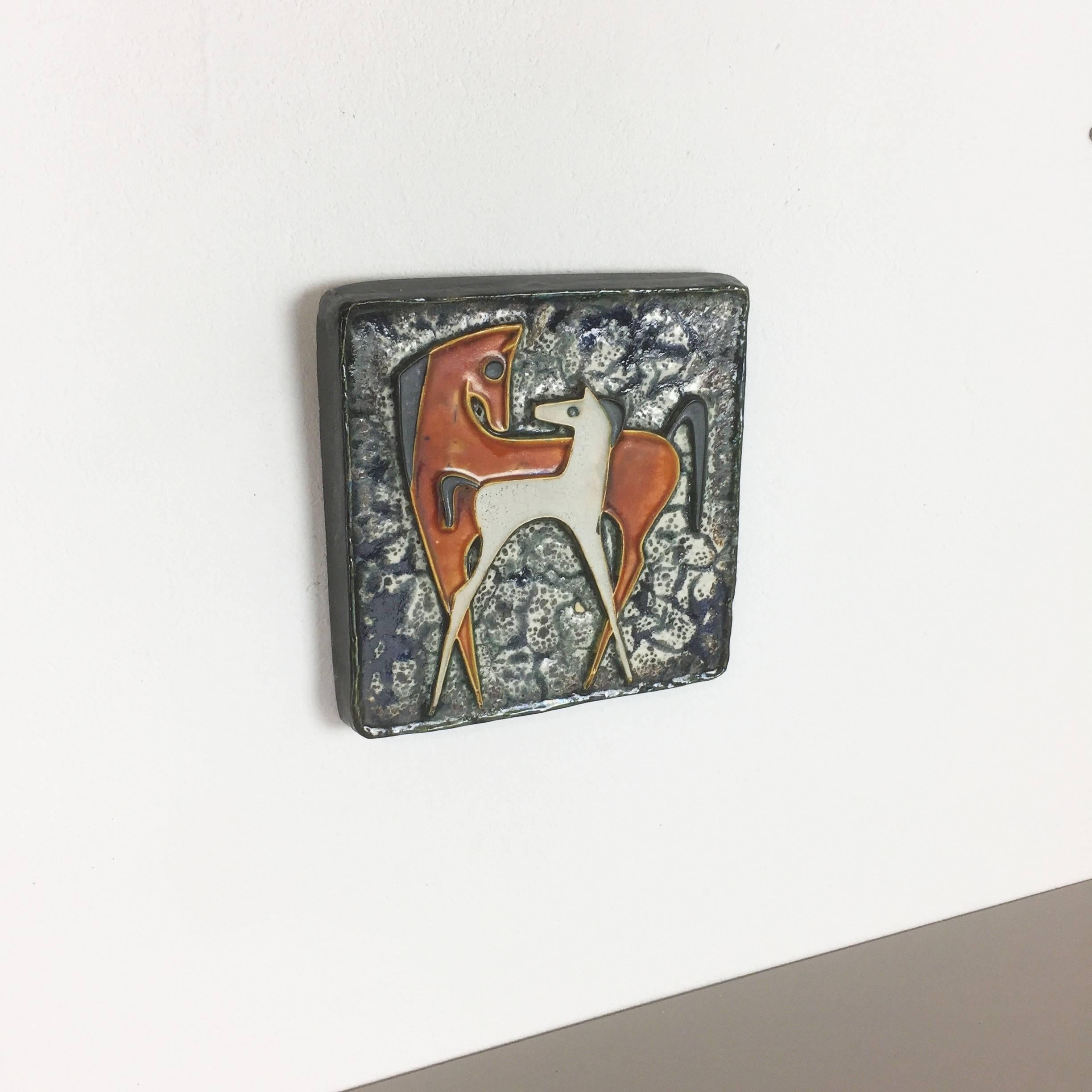 Article:

Ceramic wall plate


Decade:

1960s


Producer:

Atelier Schäffenacker, Ulm Germany


Design: 

Helmut Schäffenacker


This original vintage ceramic wall plate with abstract hand-painted and colorful illustrations of