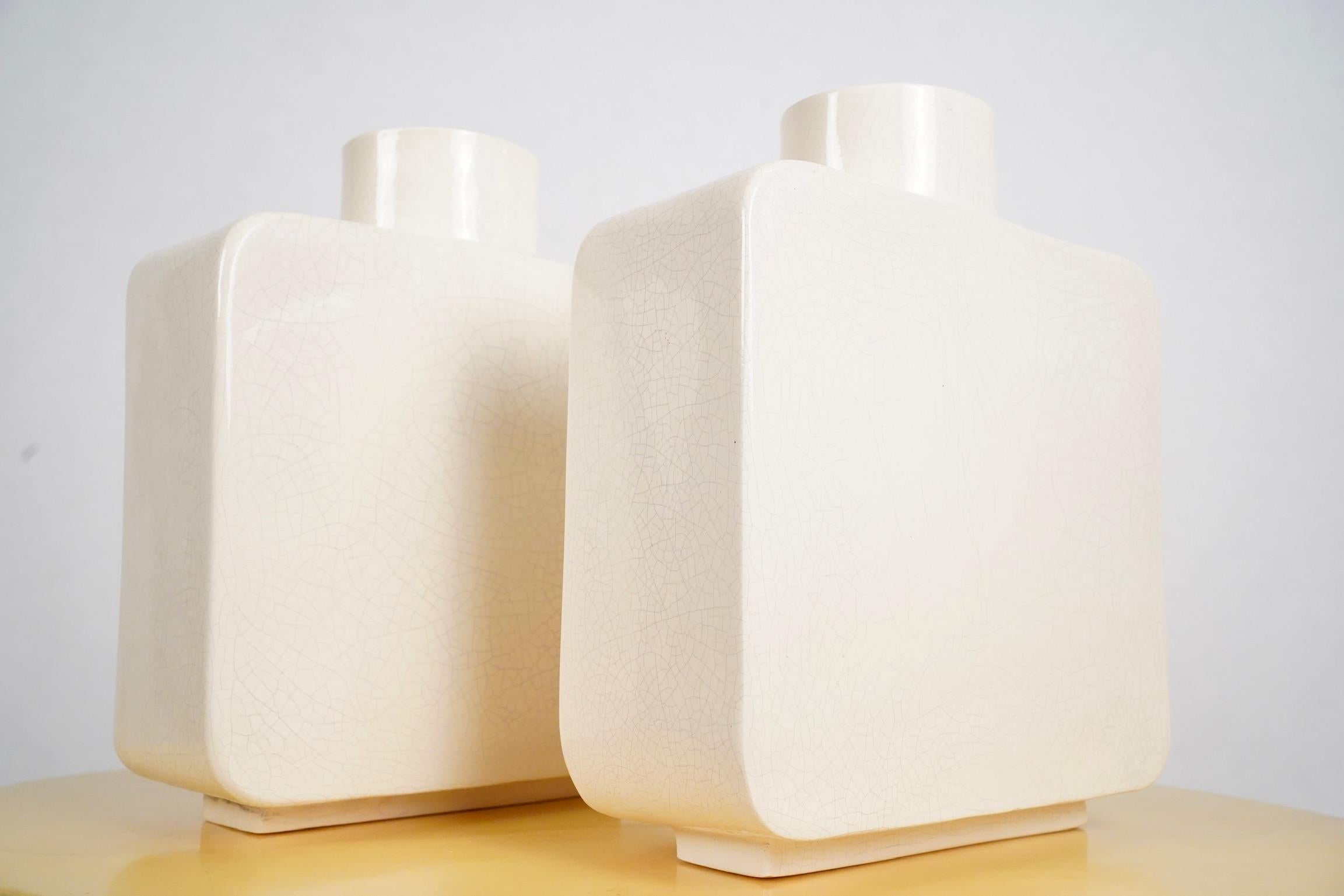 Modernist white ceramic vases, a pair. Studio-made by then NYC-based American ceramicist, Roy Hamilton circa 1960s. Impressive in scale and with wonderful crackle glaze in excellent condition. Quite unique and vintage yet utterly modern. Signed to